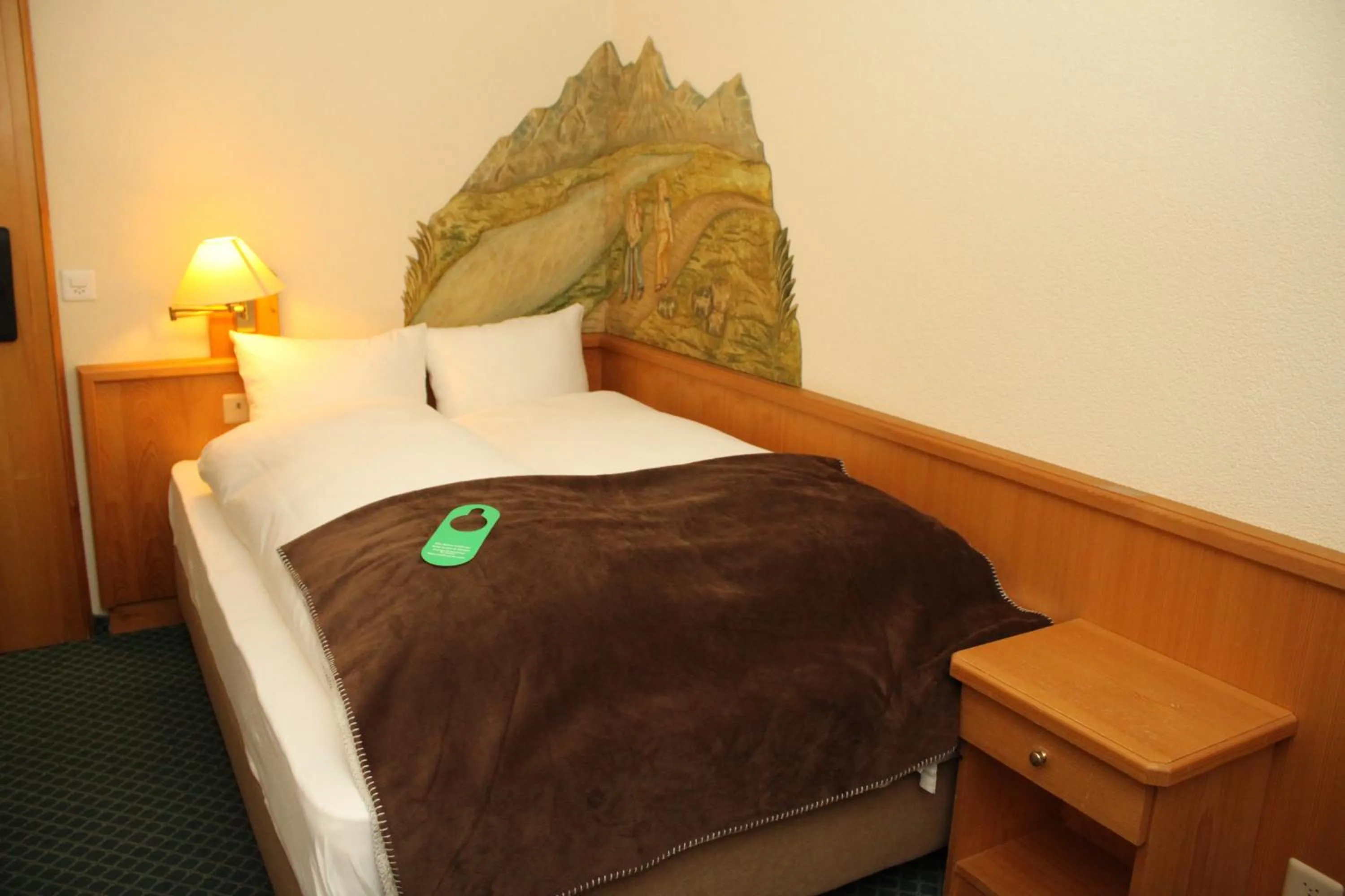 Bed in Grichting Hotel & Serviced Apartments