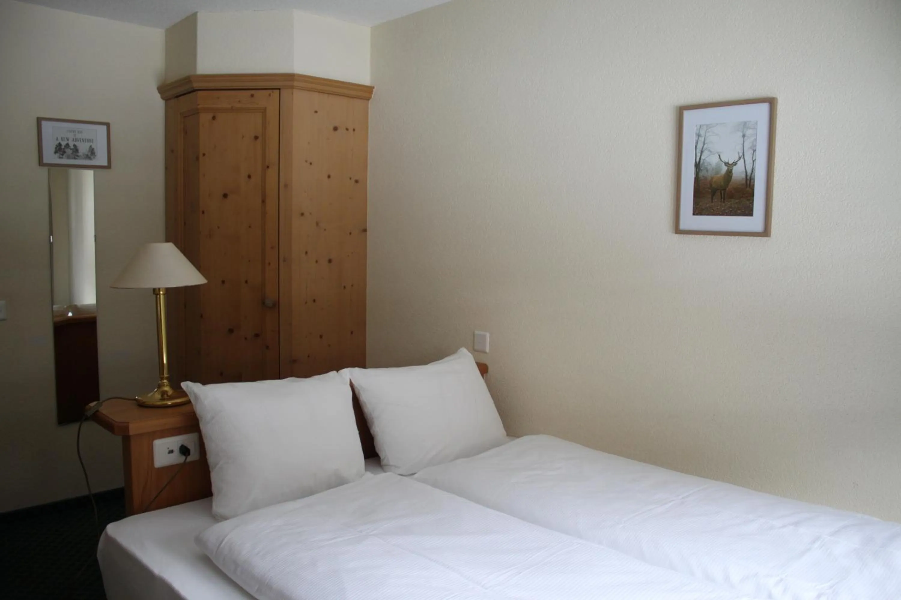 Bed in Grichting Hotel & Serviced Apartments