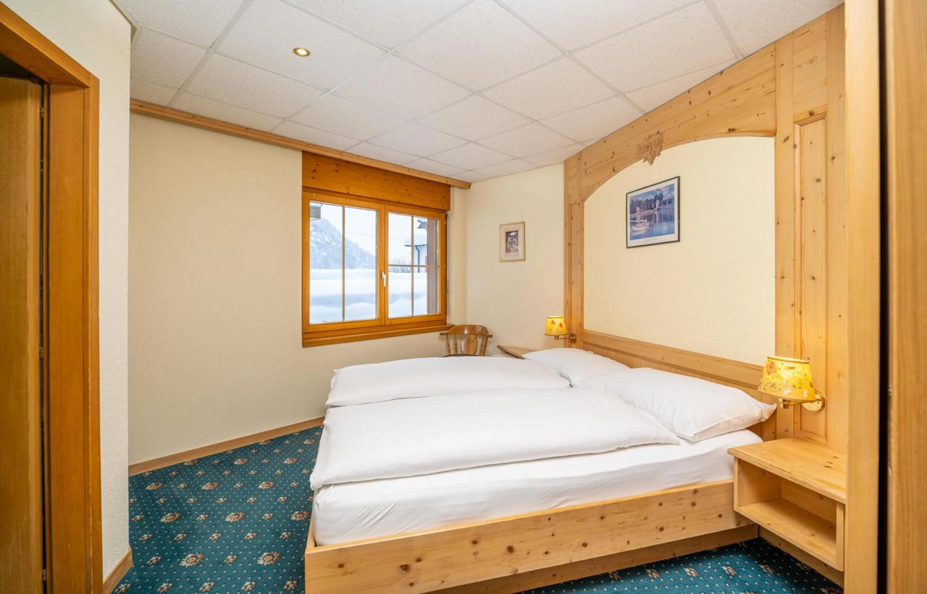 Bedroom, Bed in Grichting Hotel & Serviced Apartments