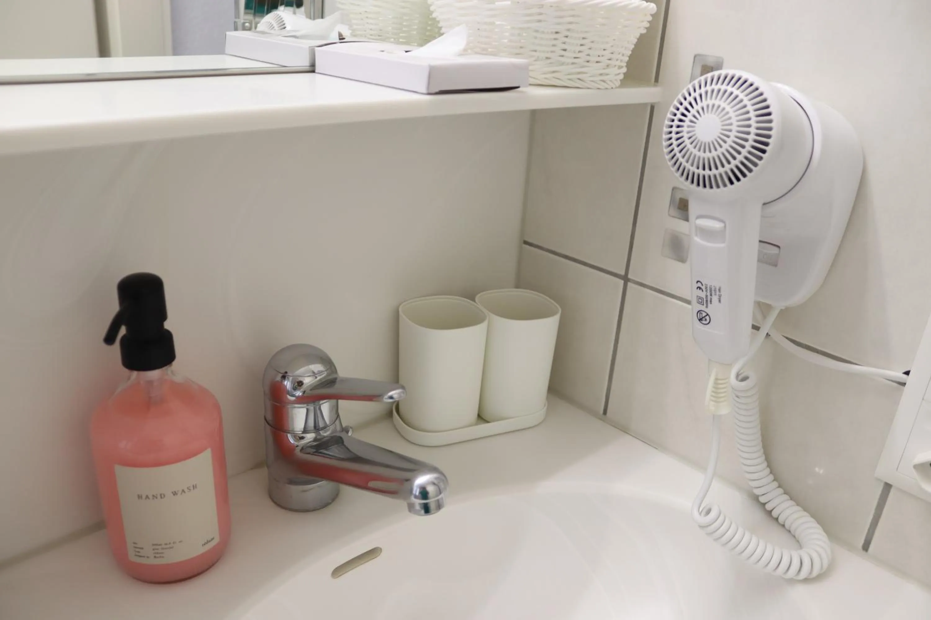 Bathroom in Grichting Hotel & Serviced Apartments