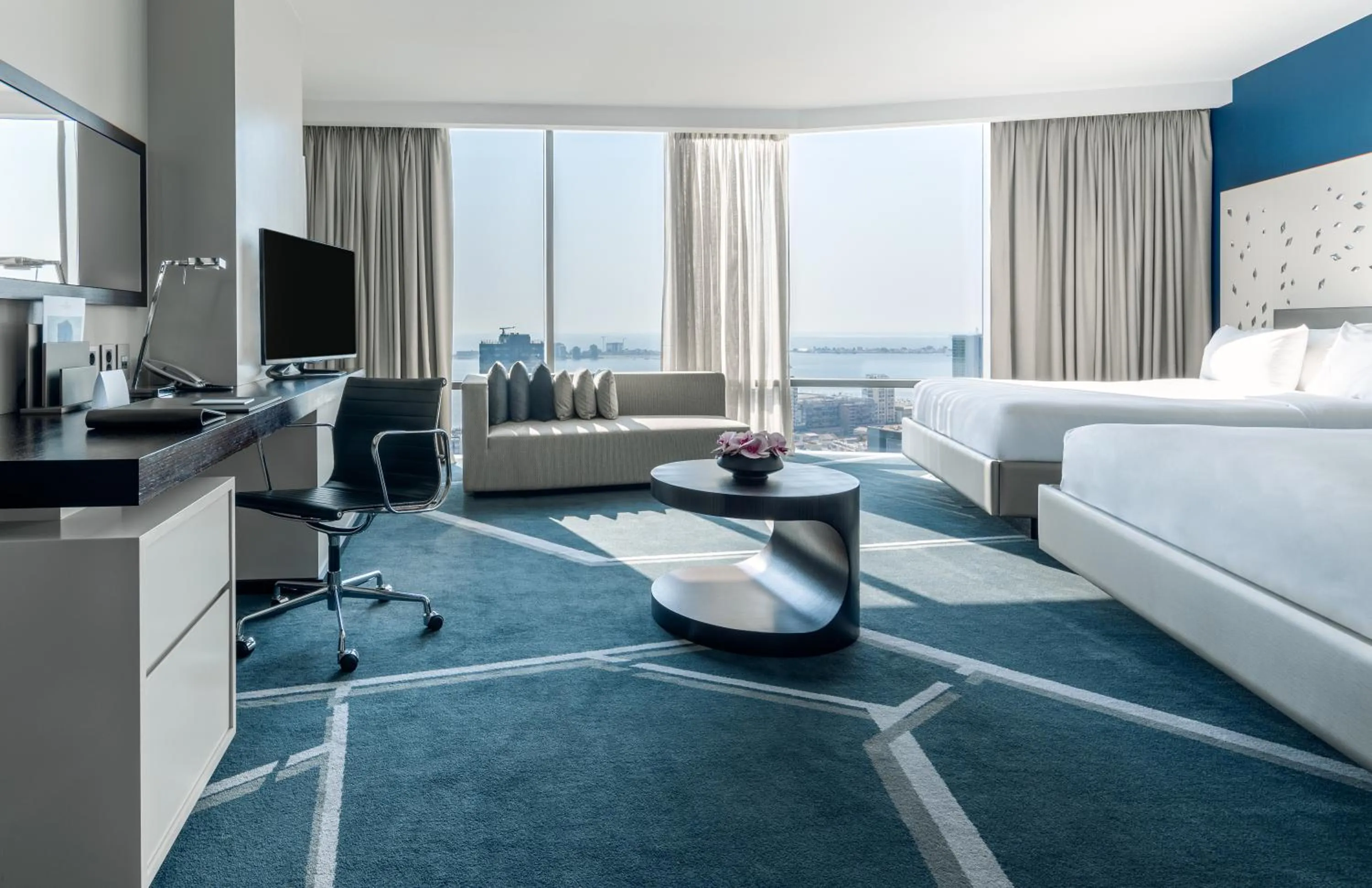 Communal lounge/ TV room, Bed in InterContinental Luanda Miramar by IHG