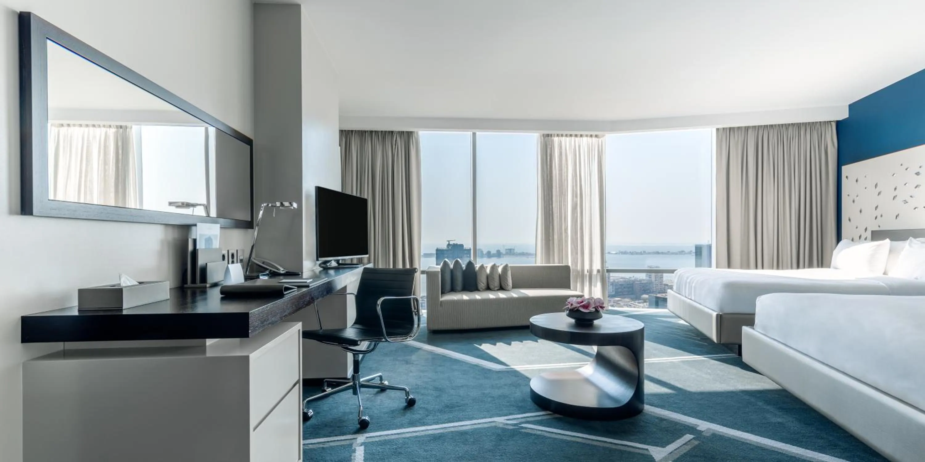 Communal lounge/ TV room, Bed in InterContinental Luanda Miramar by IHG