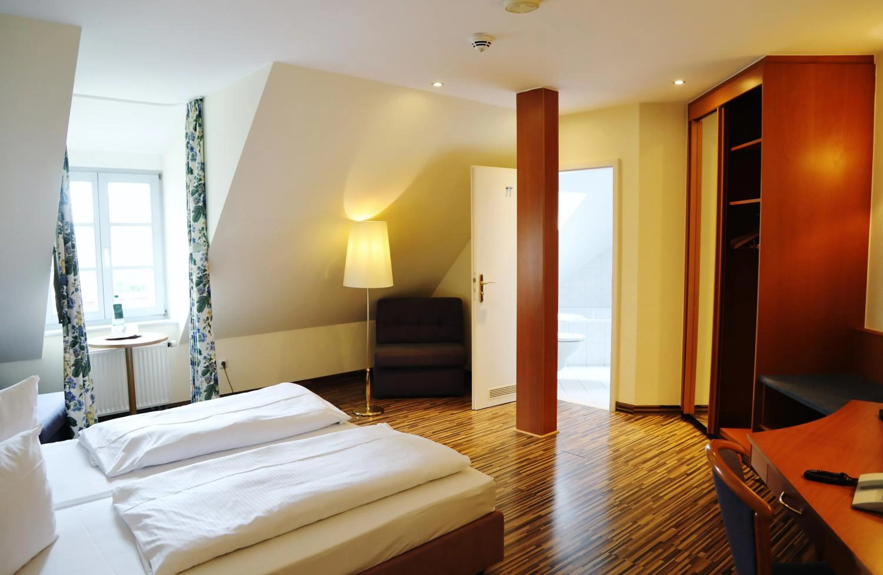 Photo of the whole room, Bed in eXo Hotel Franka Bamberg - by NeVo Hotels