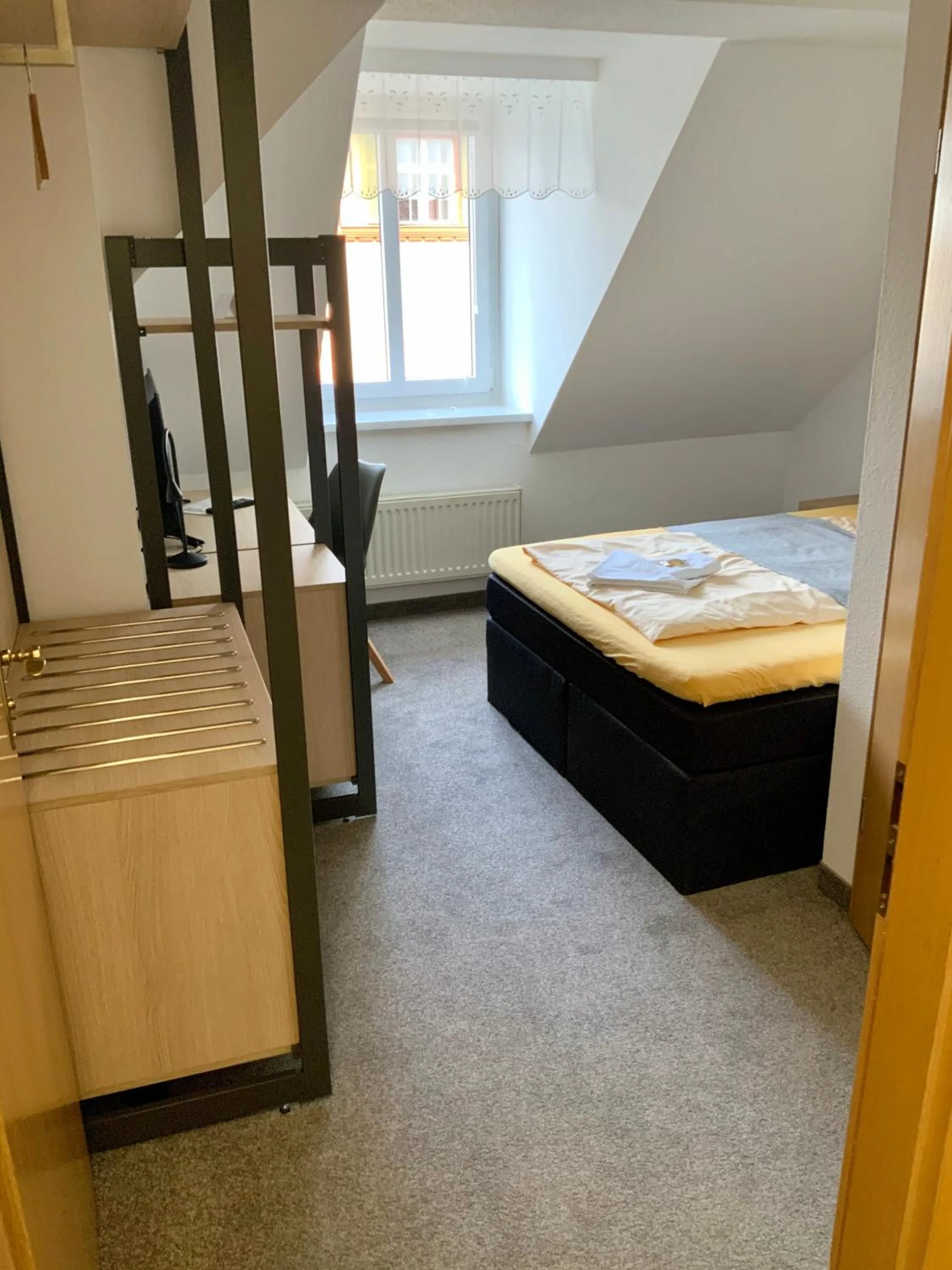 Photo of the whole room, Bed in Bluhm's Hotel & Restaurant am Markt