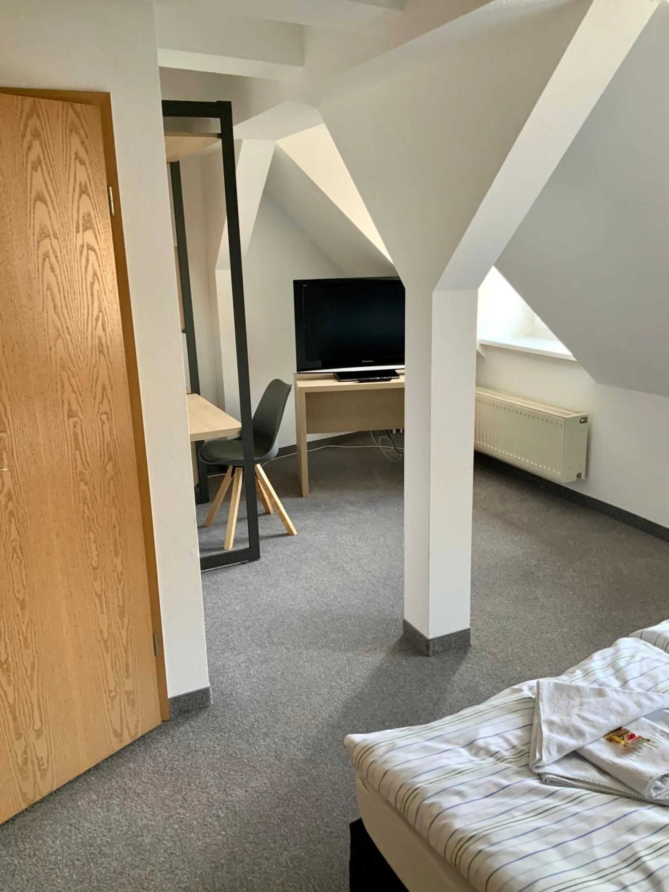 Photo of the whole room, Bed in Bluhm's Hotel & Restaurant am Markt