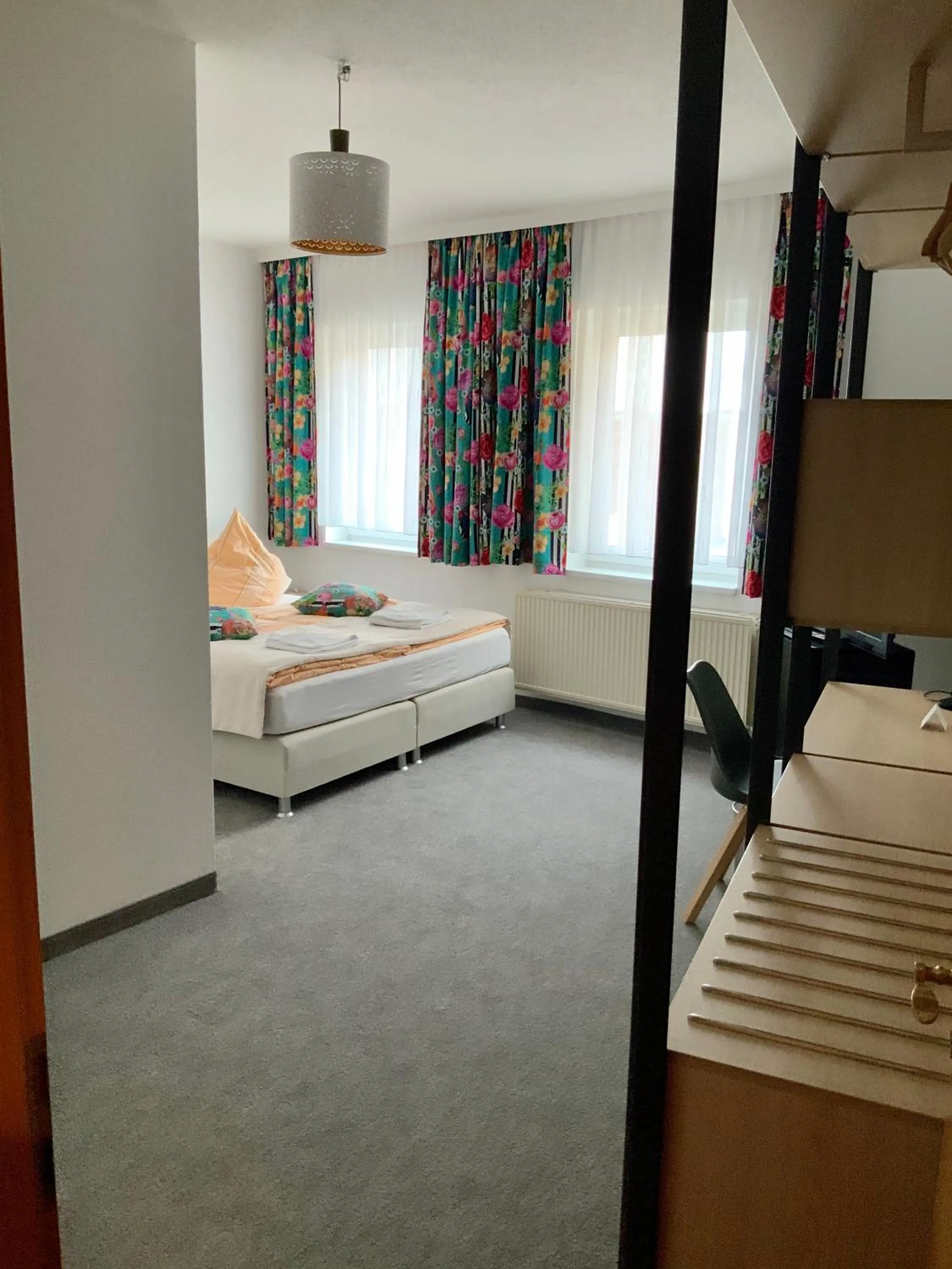 Photo of the whole room, Bed in Bluhm's Hotel & Restaurant am Markt