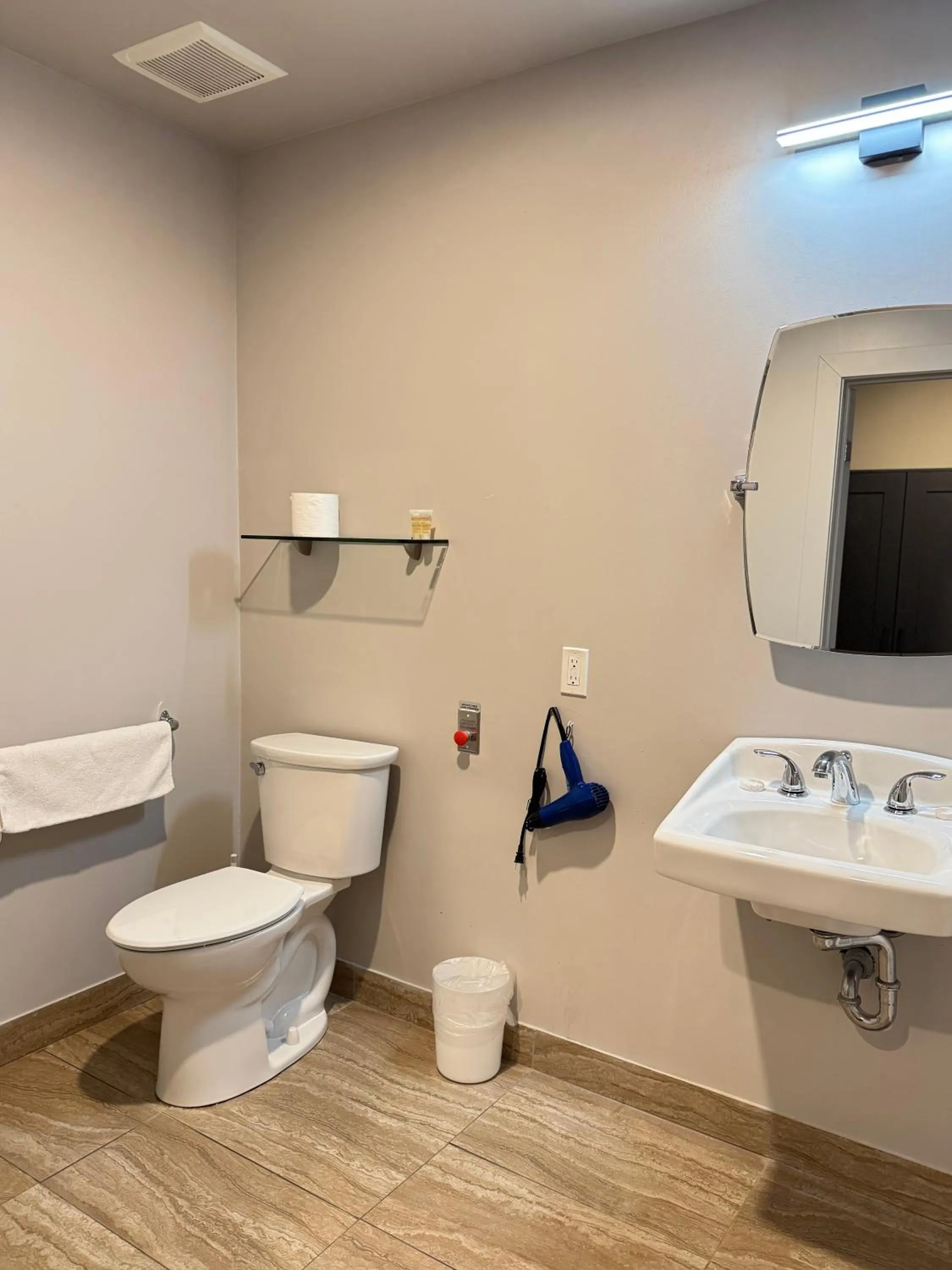 Toilet in Big Bird Inn Wawa, SureStay Collection by Best Western