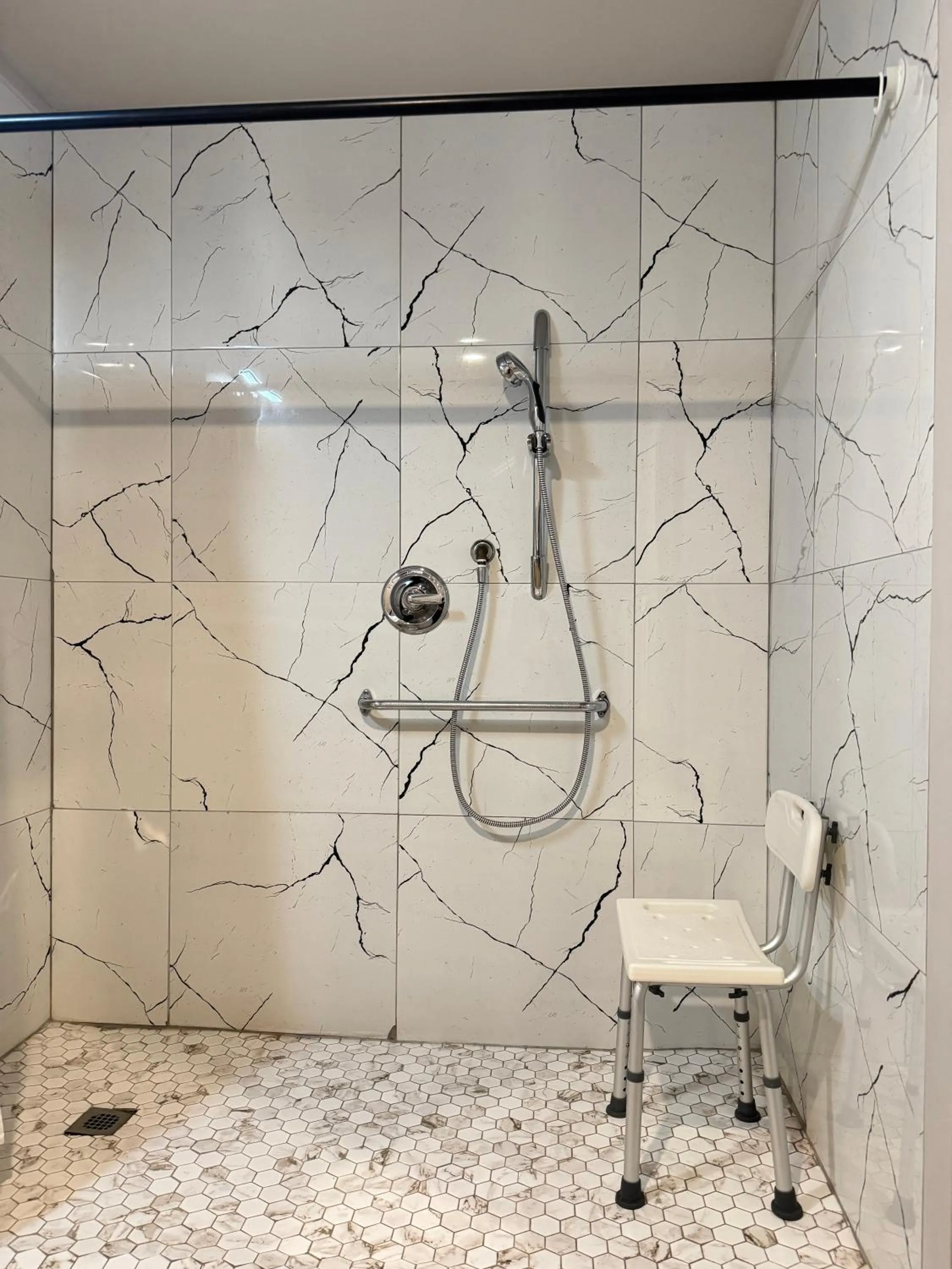 Shower in Big Bird Inn Wawa, SureStay Collection by Best Western