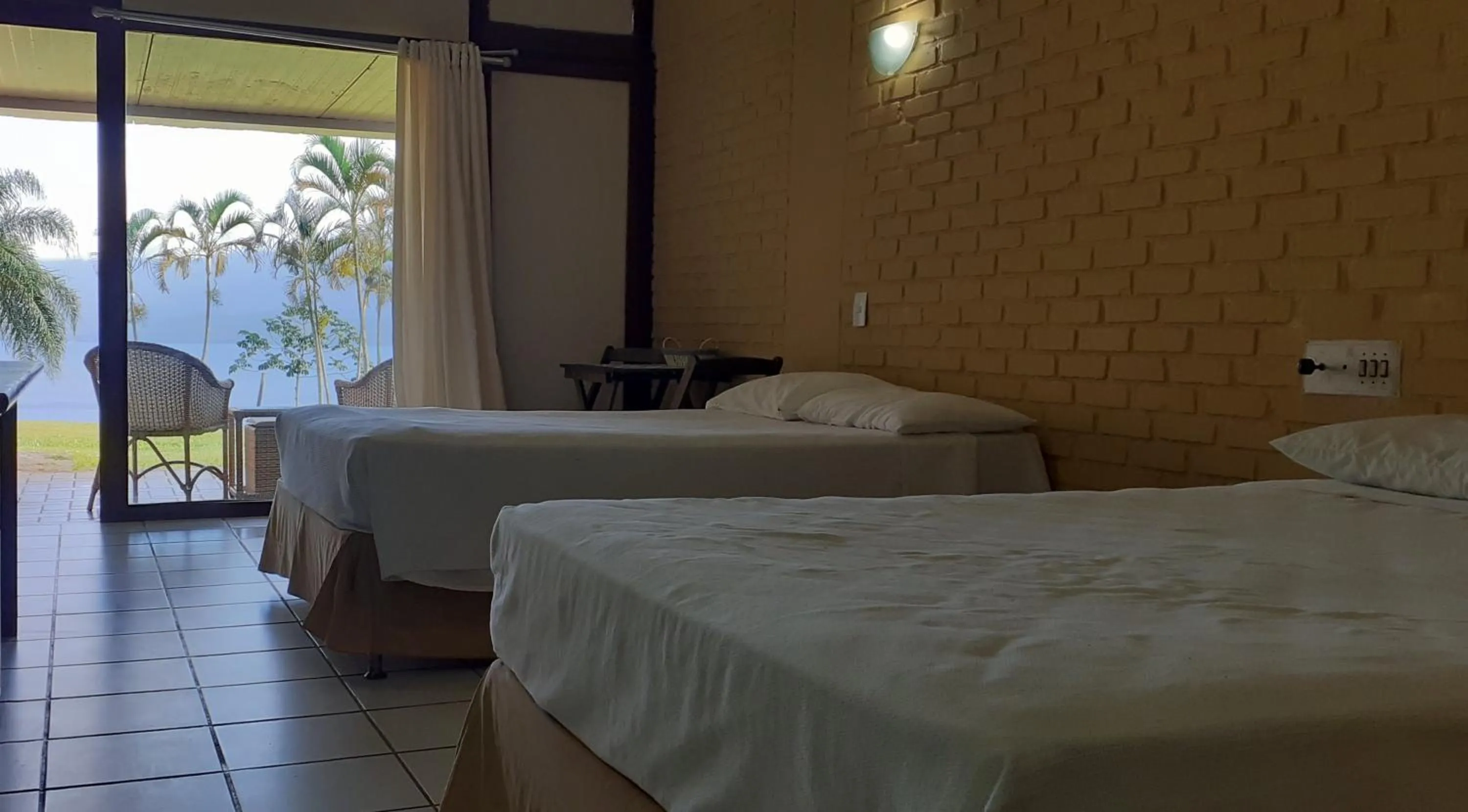 Bed in Angra dos Reis Flat Suíte no Portogalo