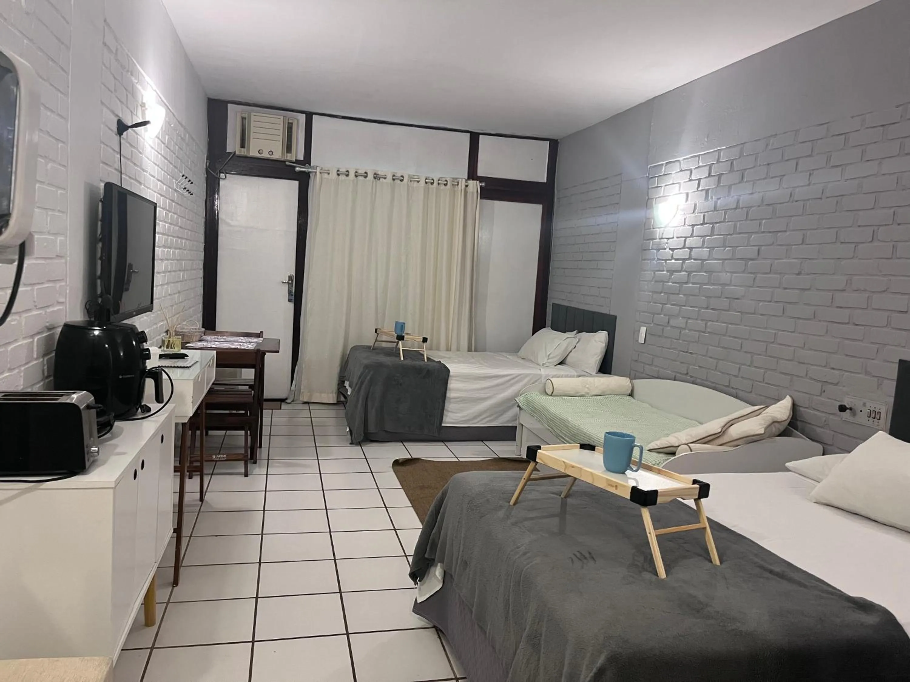 Bed in Angra dos Reis Flat Suíte no Portogalo