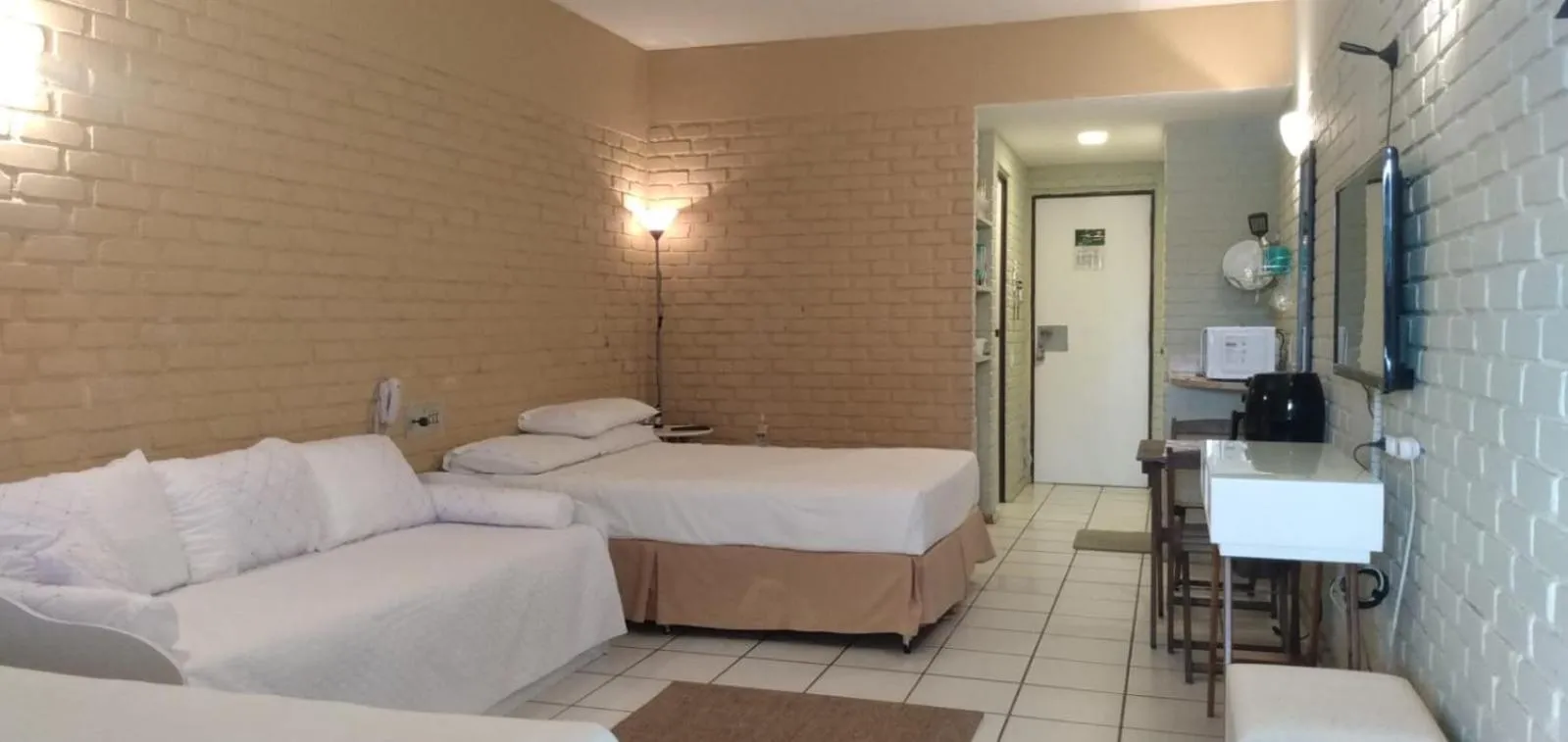 Bed in Angra dos Reis Flat Suíte no Portogalo