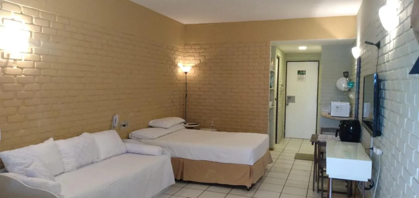 Bed in Angra dos Reis Flat Suíte no Portogalo