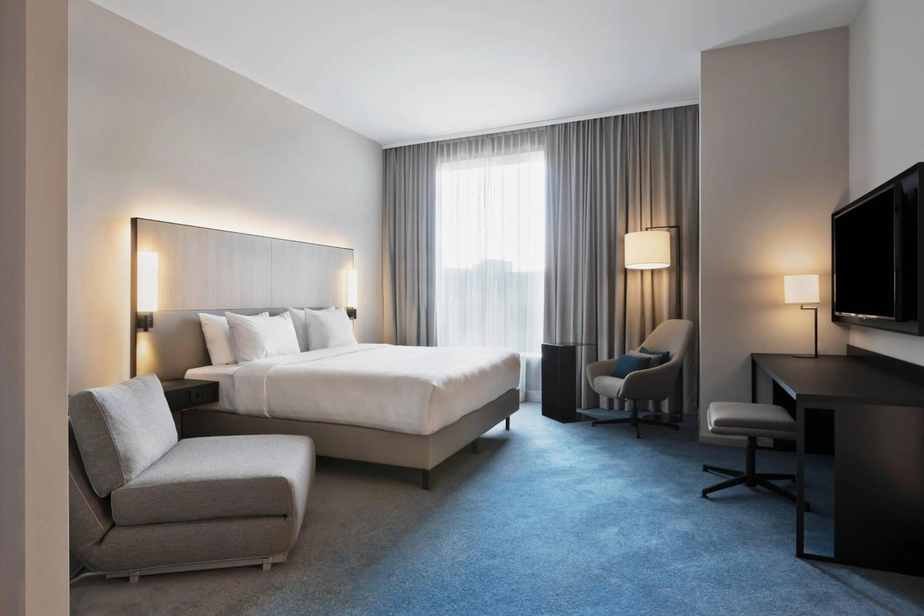 Photo of the whole room, Bed in Courtyard by Marriott Freiburg