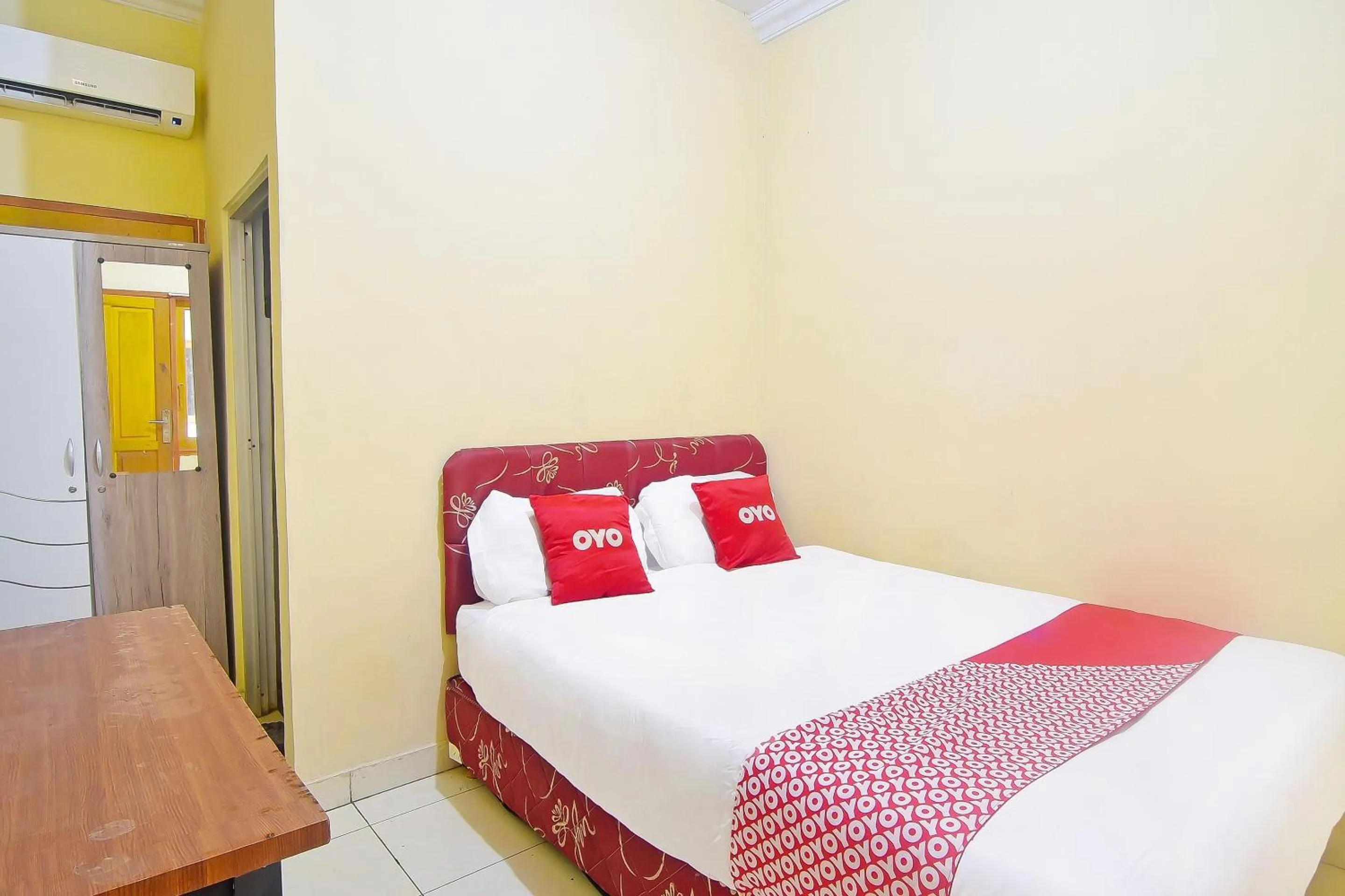 Bedroom in Hotel O A2b Guesthouse