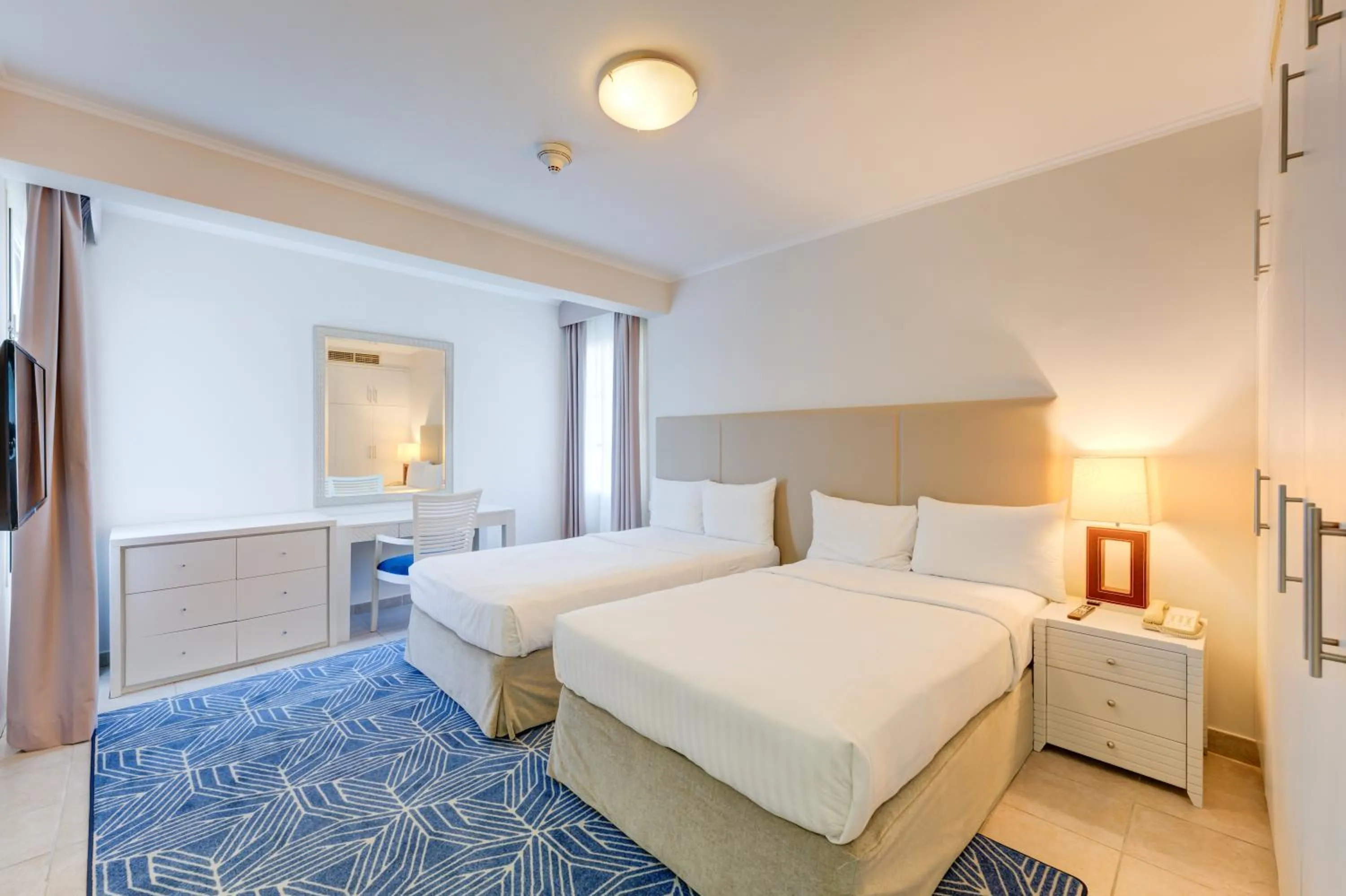 Bedroom, Bed in Millennium Lakeview Residences