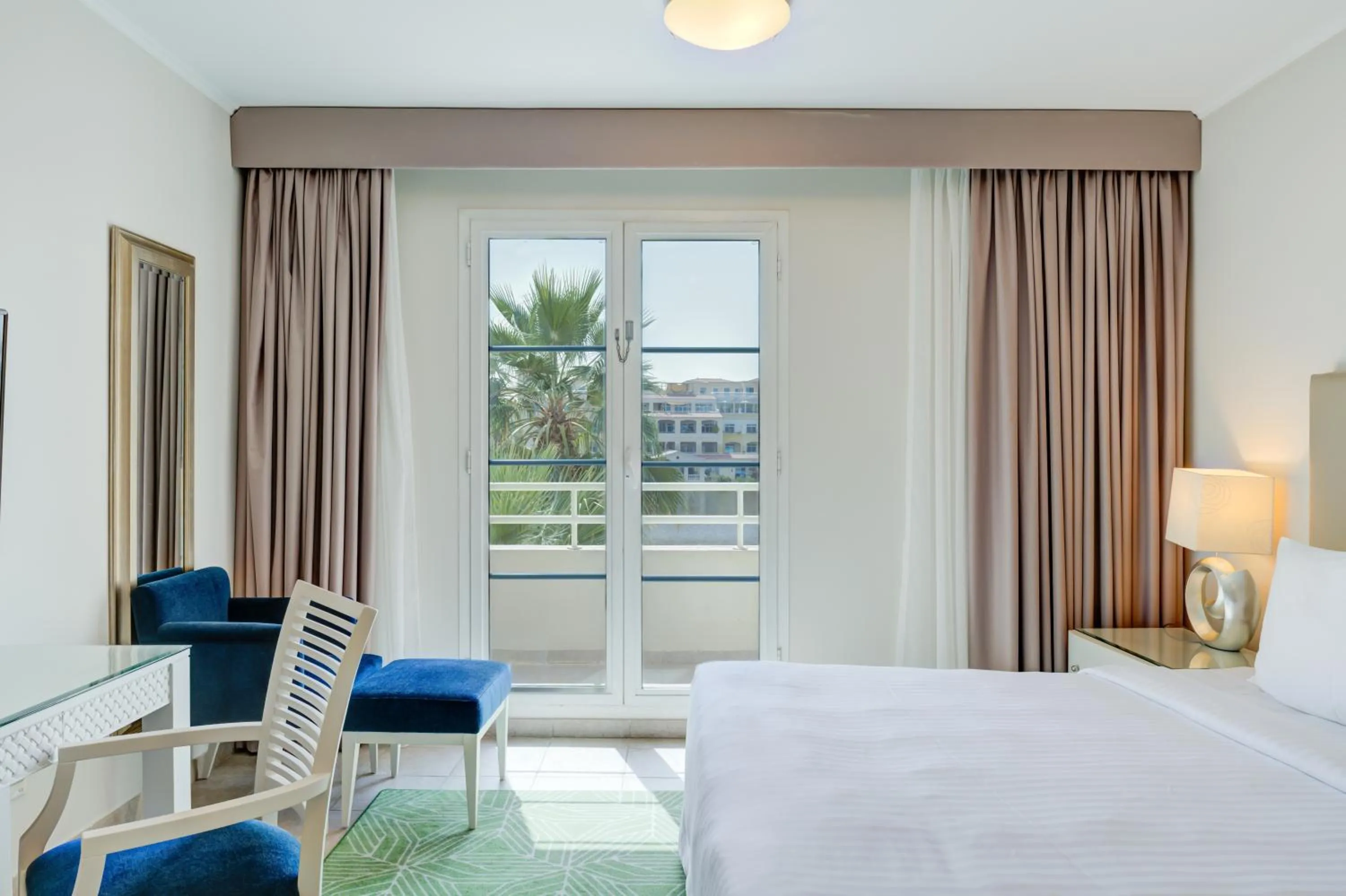 Bedroom, Bed in Millennium Lakeview Residences