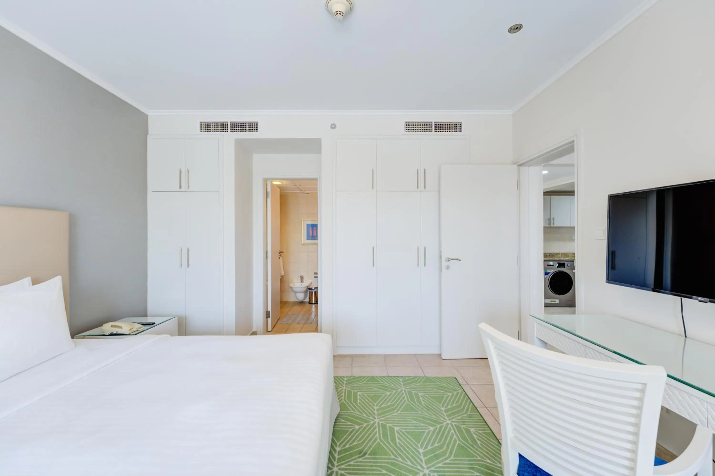 Bed in Millennium Lakeview Residences