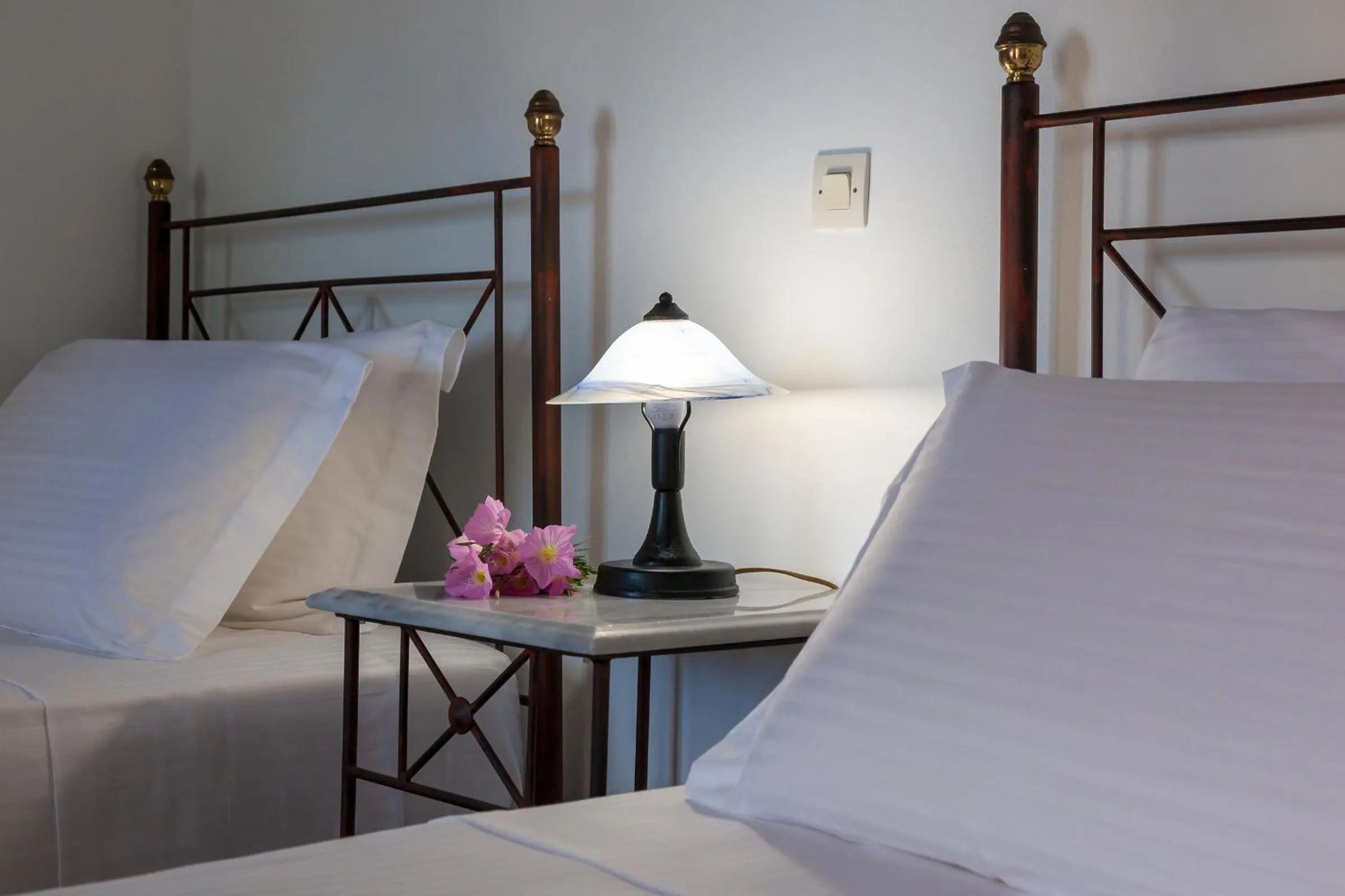 Bed in Cochili Rooms & Apartments