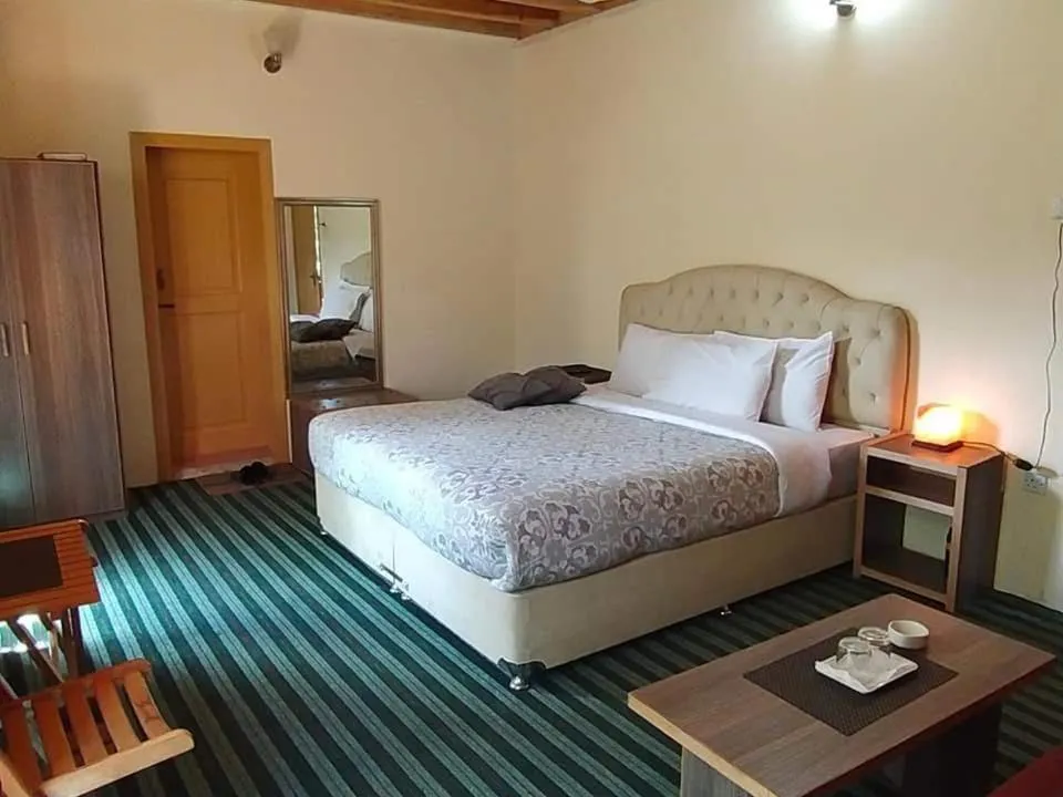 Bed in Grapes Garden Resort Hunza