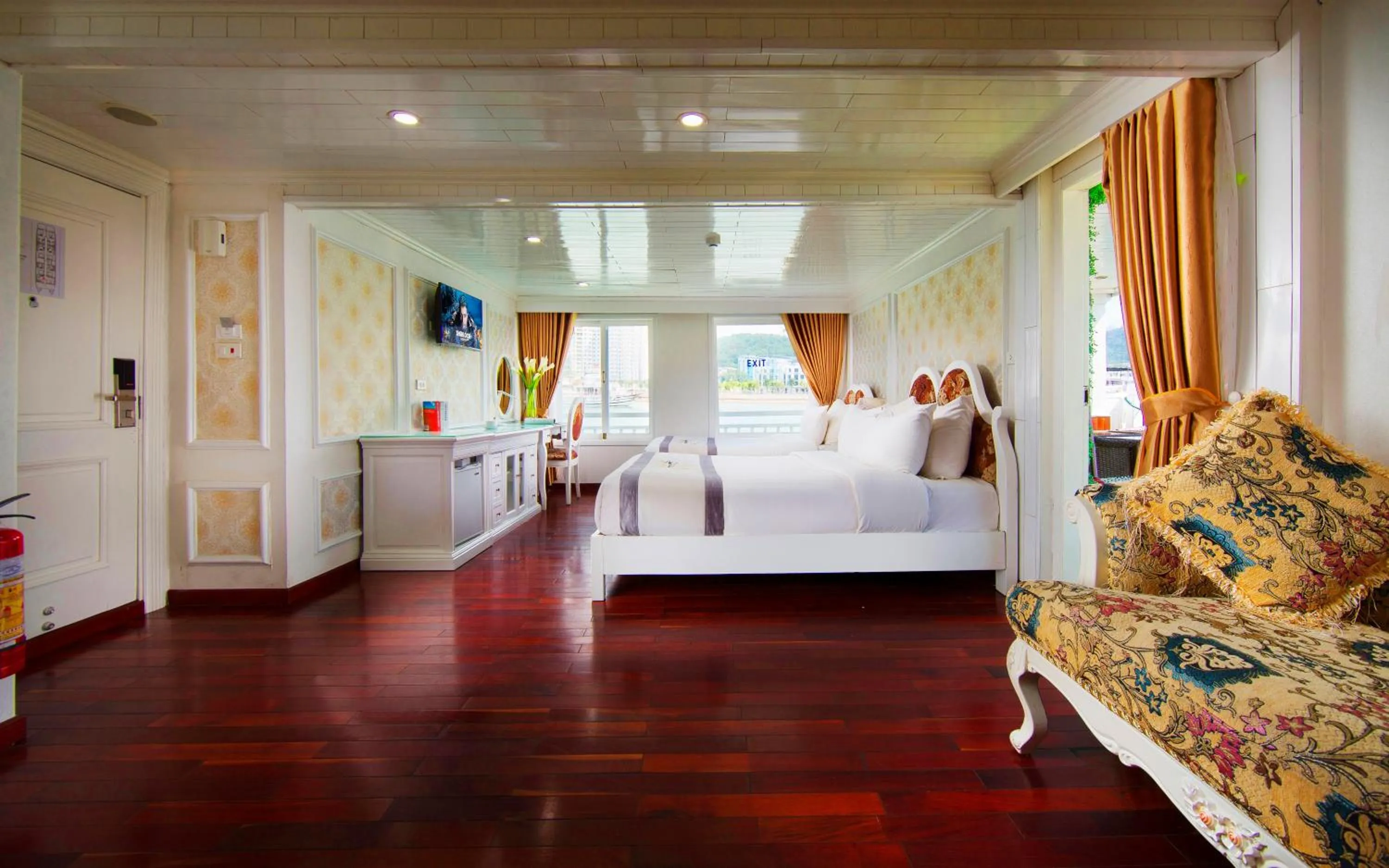 Living room, Bed in Signature Halong Cruise