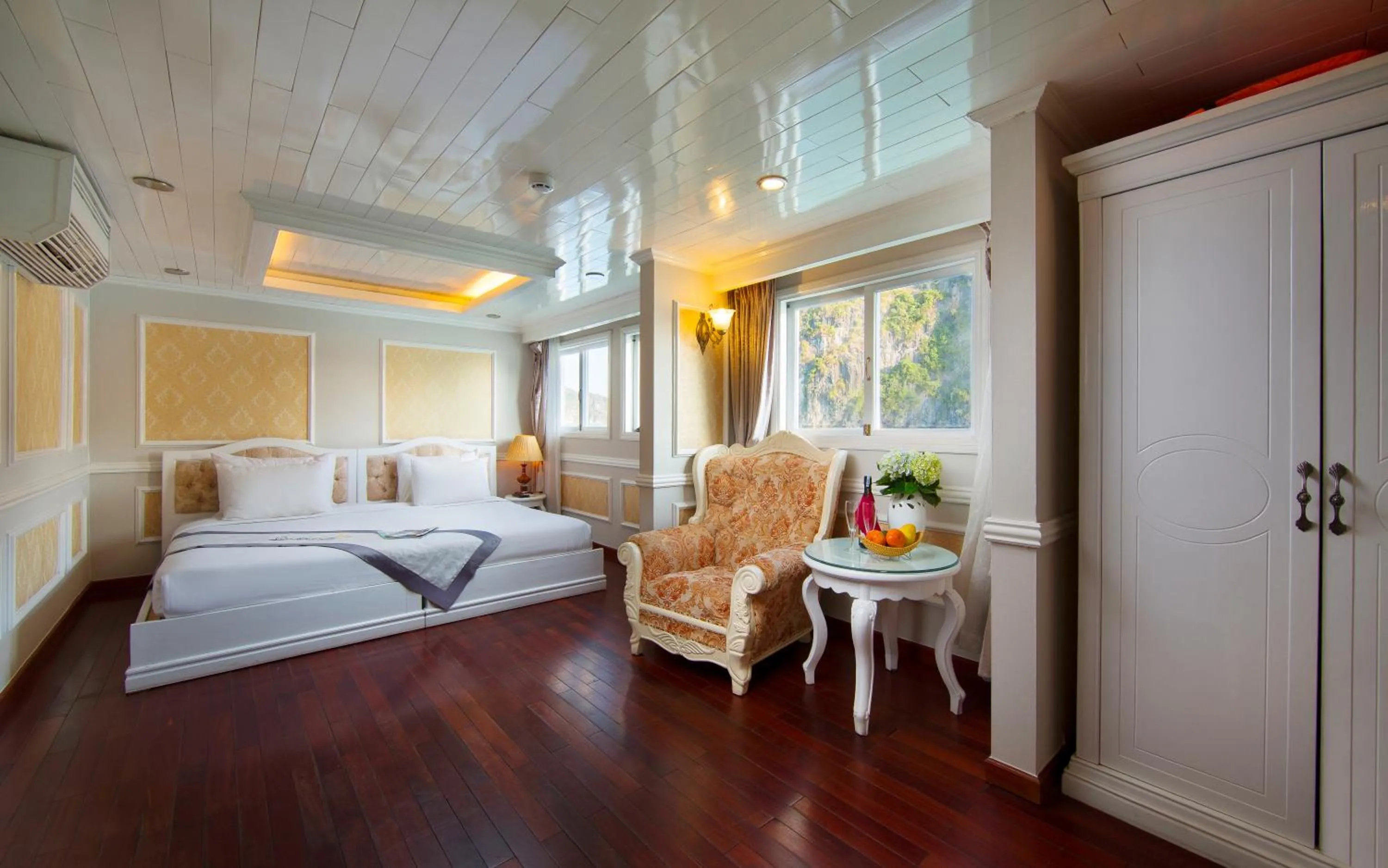 Living room, Bed in Signature Halong Cruise