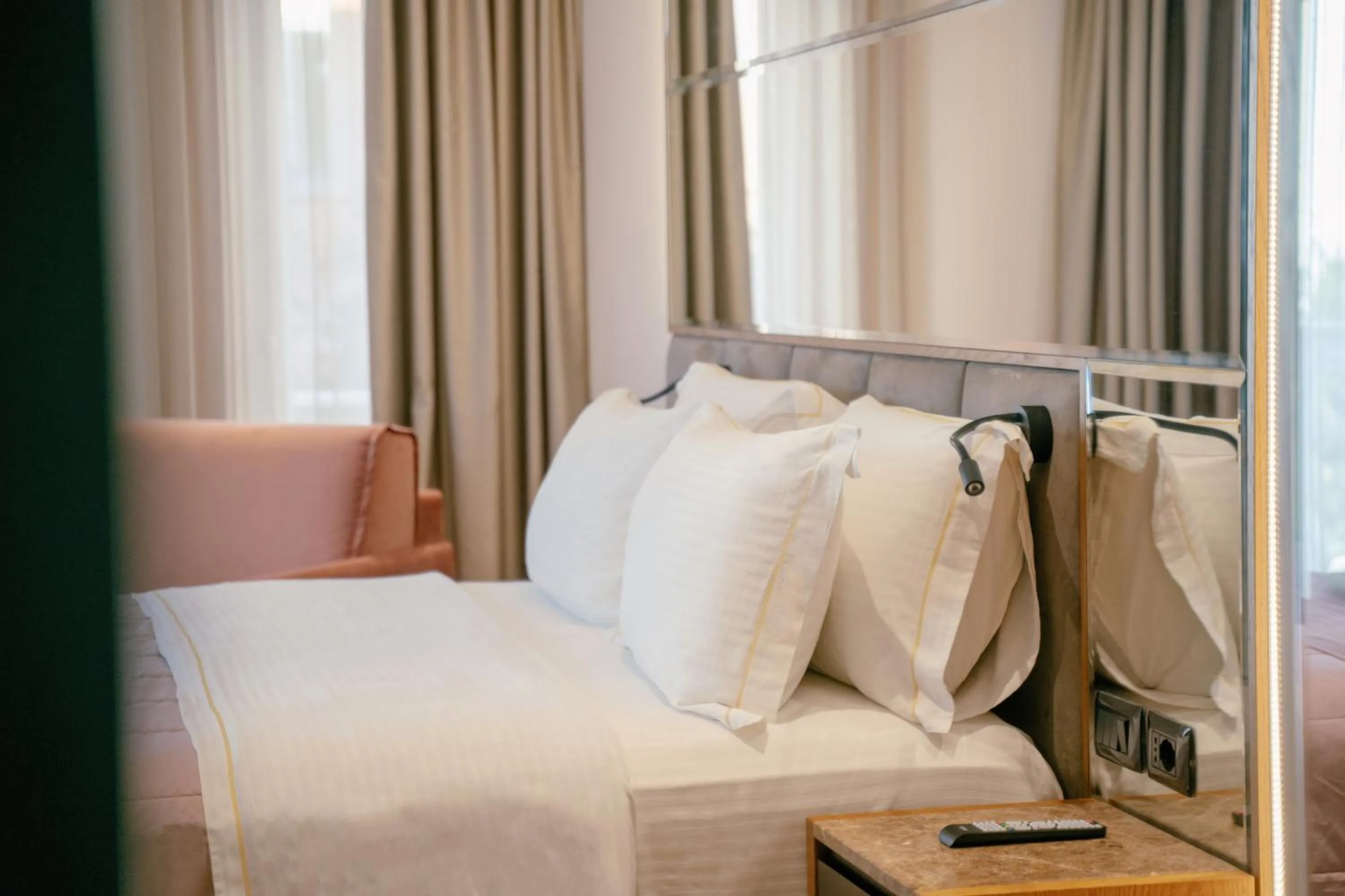 Bed in Moenia Boutique Hotel