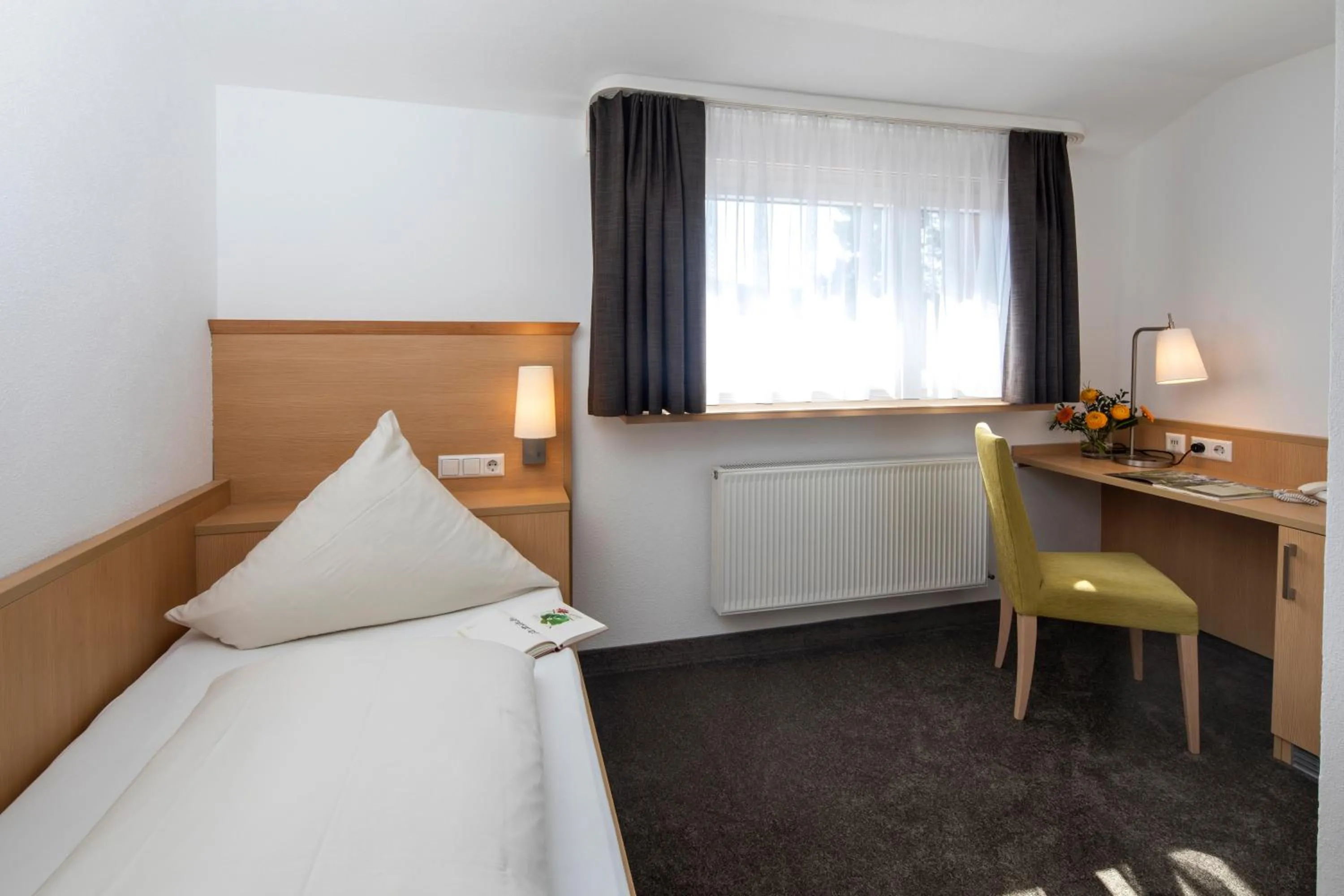 Photo of the whole room, Bed in Landhotel Sonnenhalde