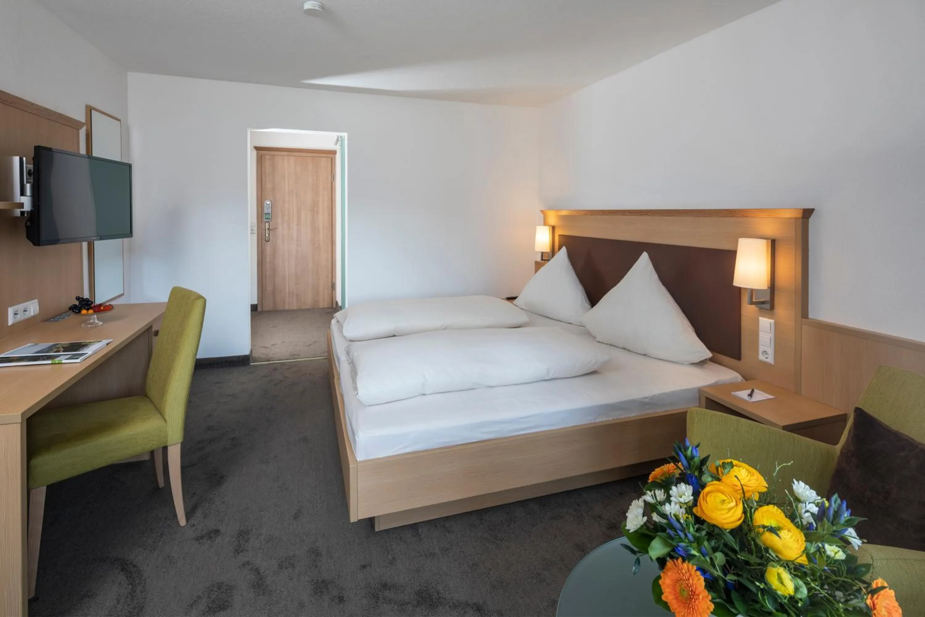 Photo of the whole room, Bed in Landhotel Sonnenhalde