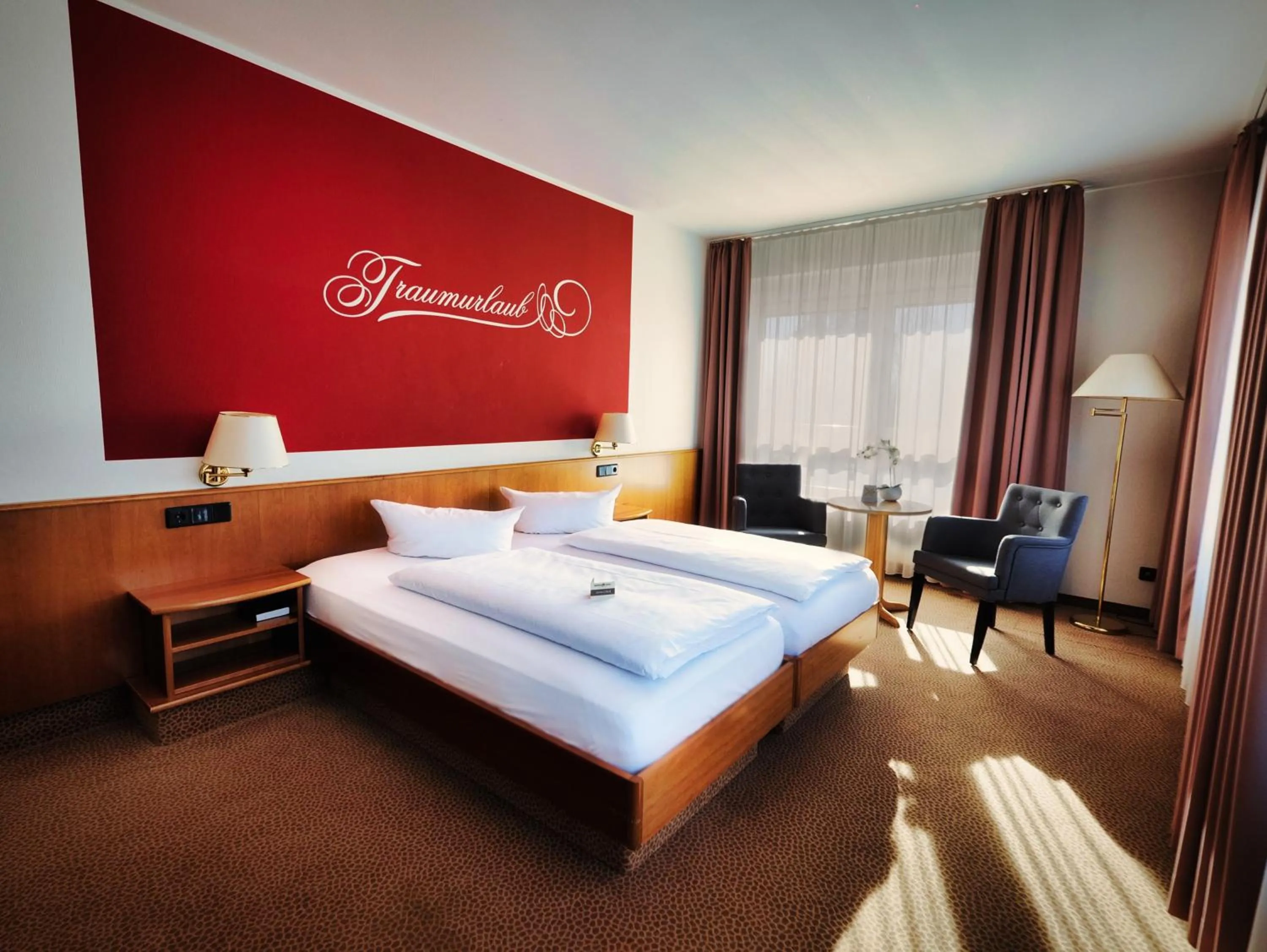 Photo of the whole room, Bed in Hotel Sportwelt Radeberg