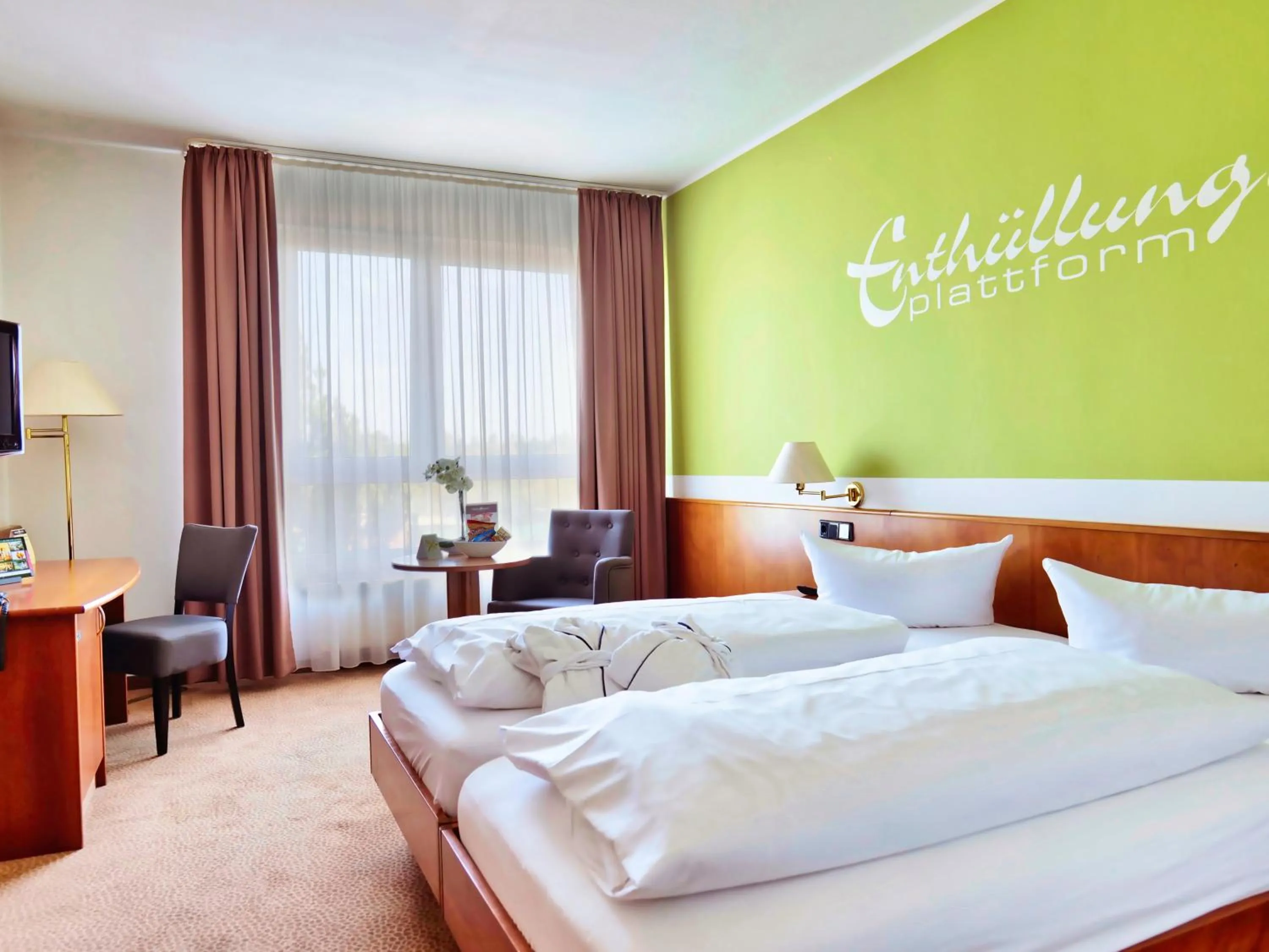 Photo of the whole room, Bed in Hotel Sportwelt Radeberg