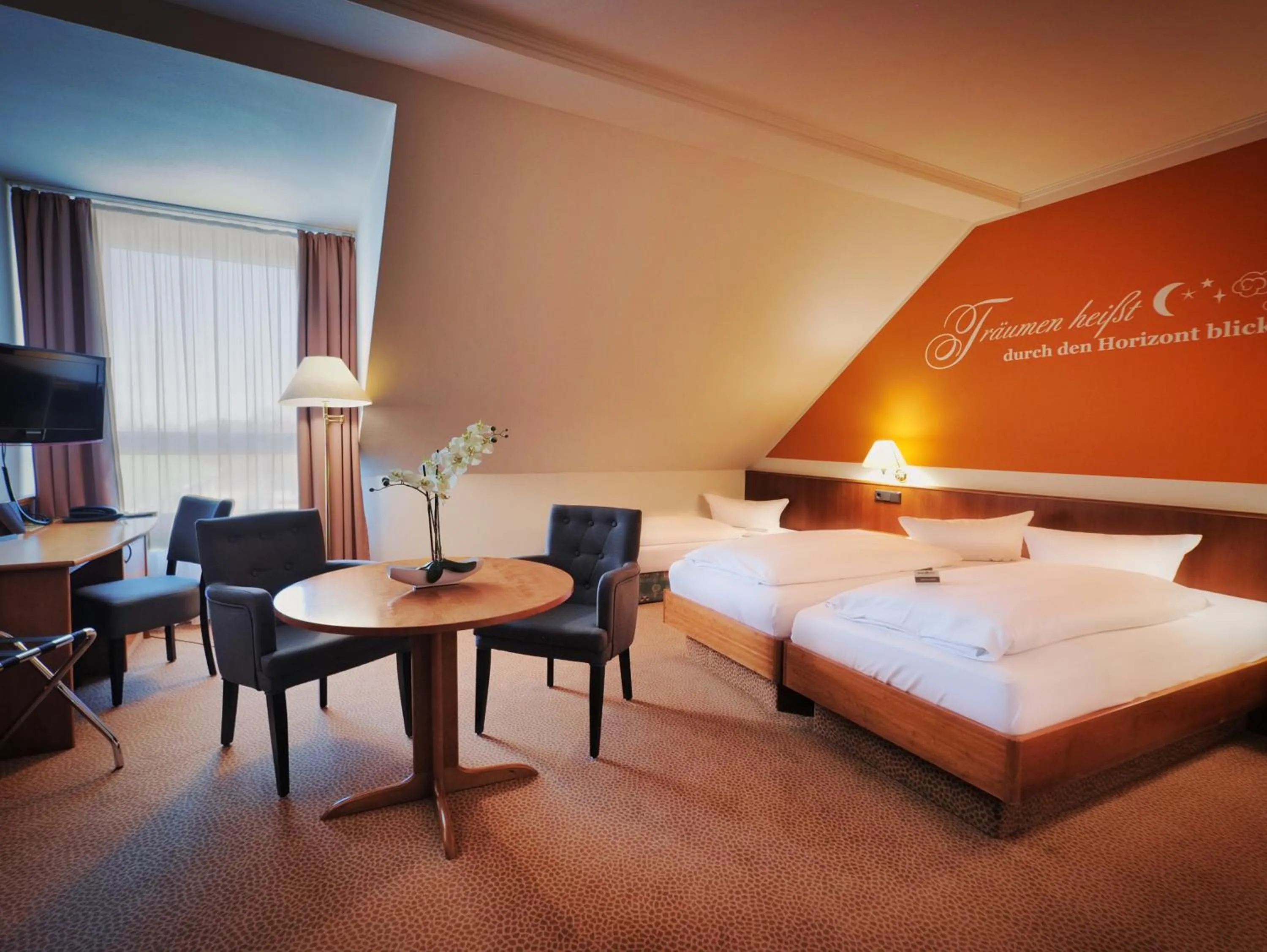 Photo of the whole room, Bed in Hotel Sportwelt Radeberg
