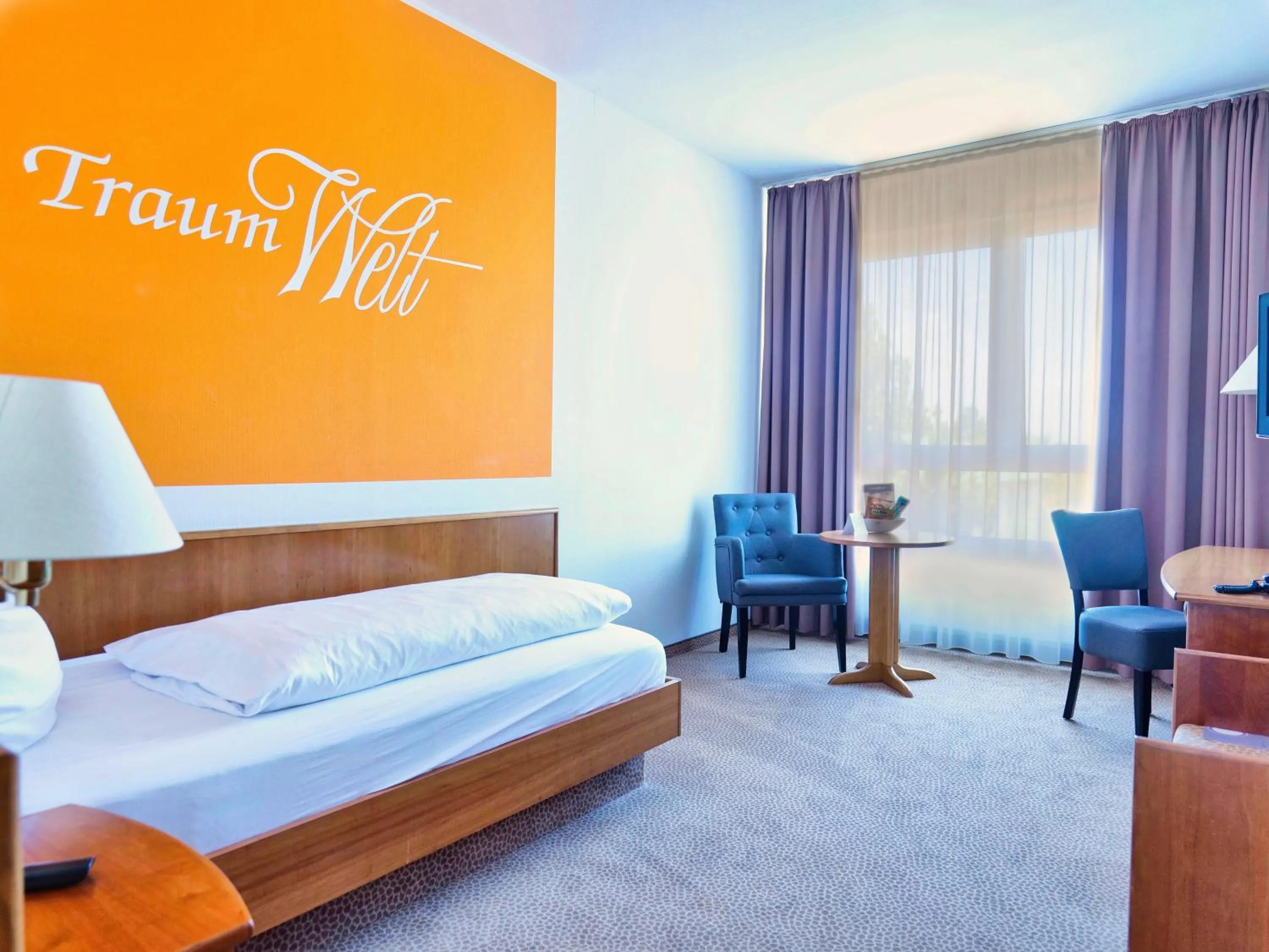 Photo of the whole room, Bed in Hotel Sportwelt Radeberg