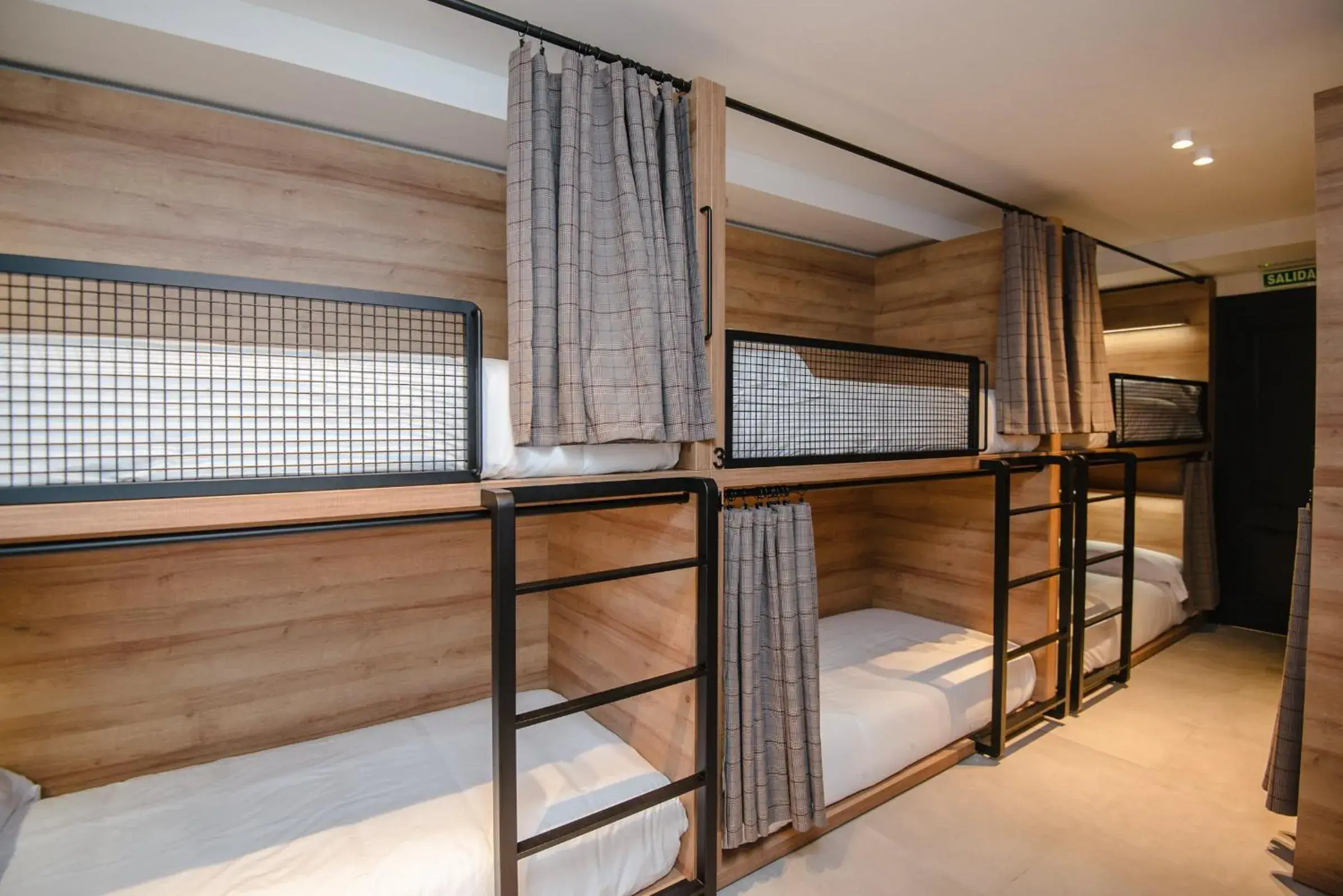 Bed in 8-Bed Mixed Dormitory Room in LATROUPE La Granja Bed in 8-Bed Mixed Dormitory Room in LATROUPE La Granja