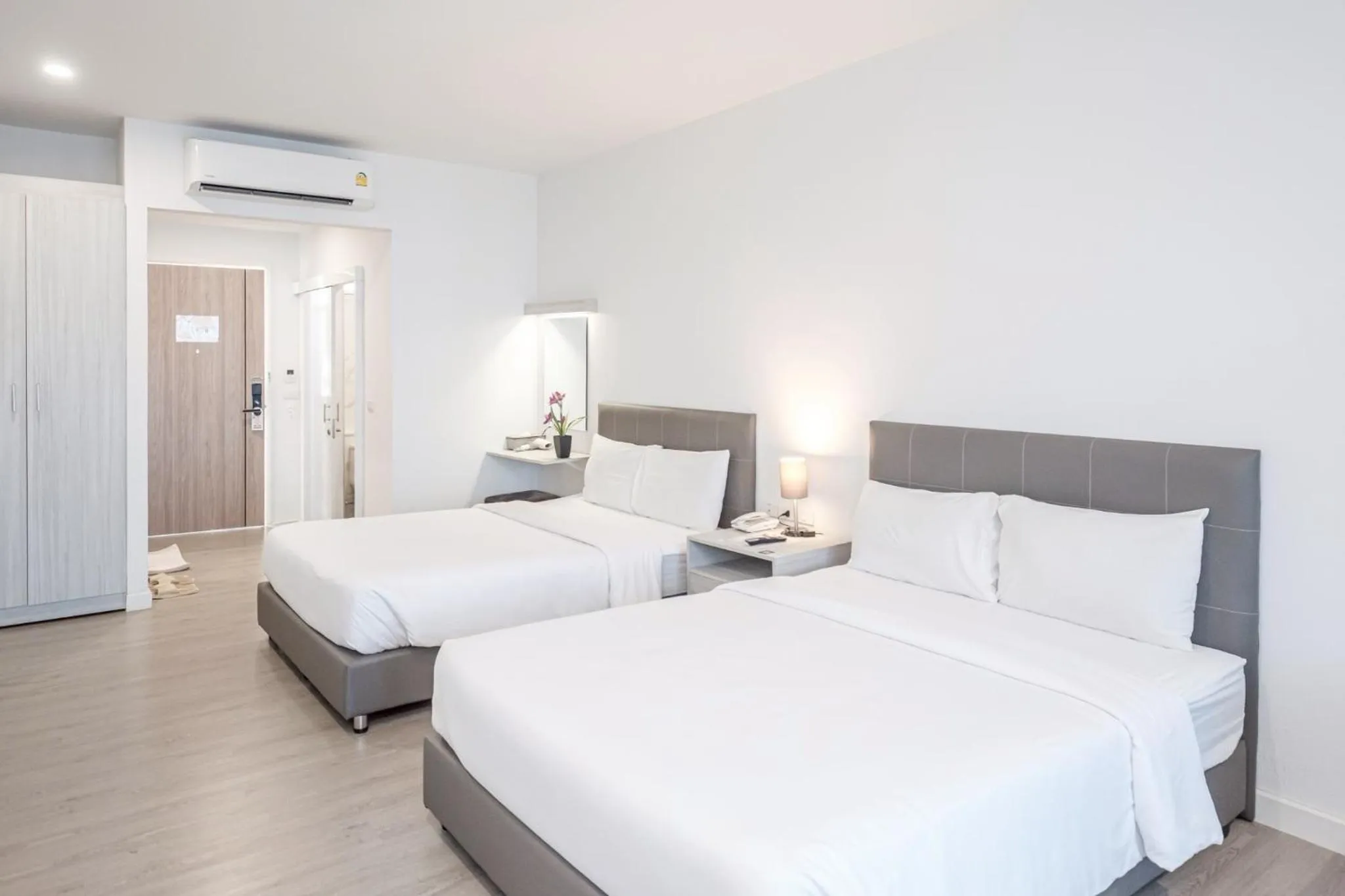 Bed in GRAND PA Hotel&Resort Lamphun Chiang Mai