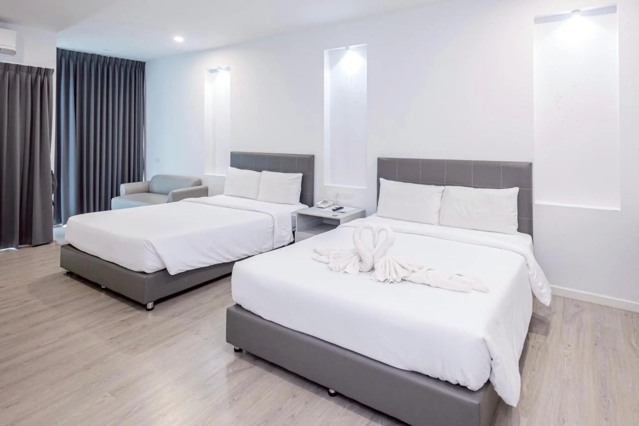 Bed in GRAND PA Hotel&Resort Lamphun Chiang Mai