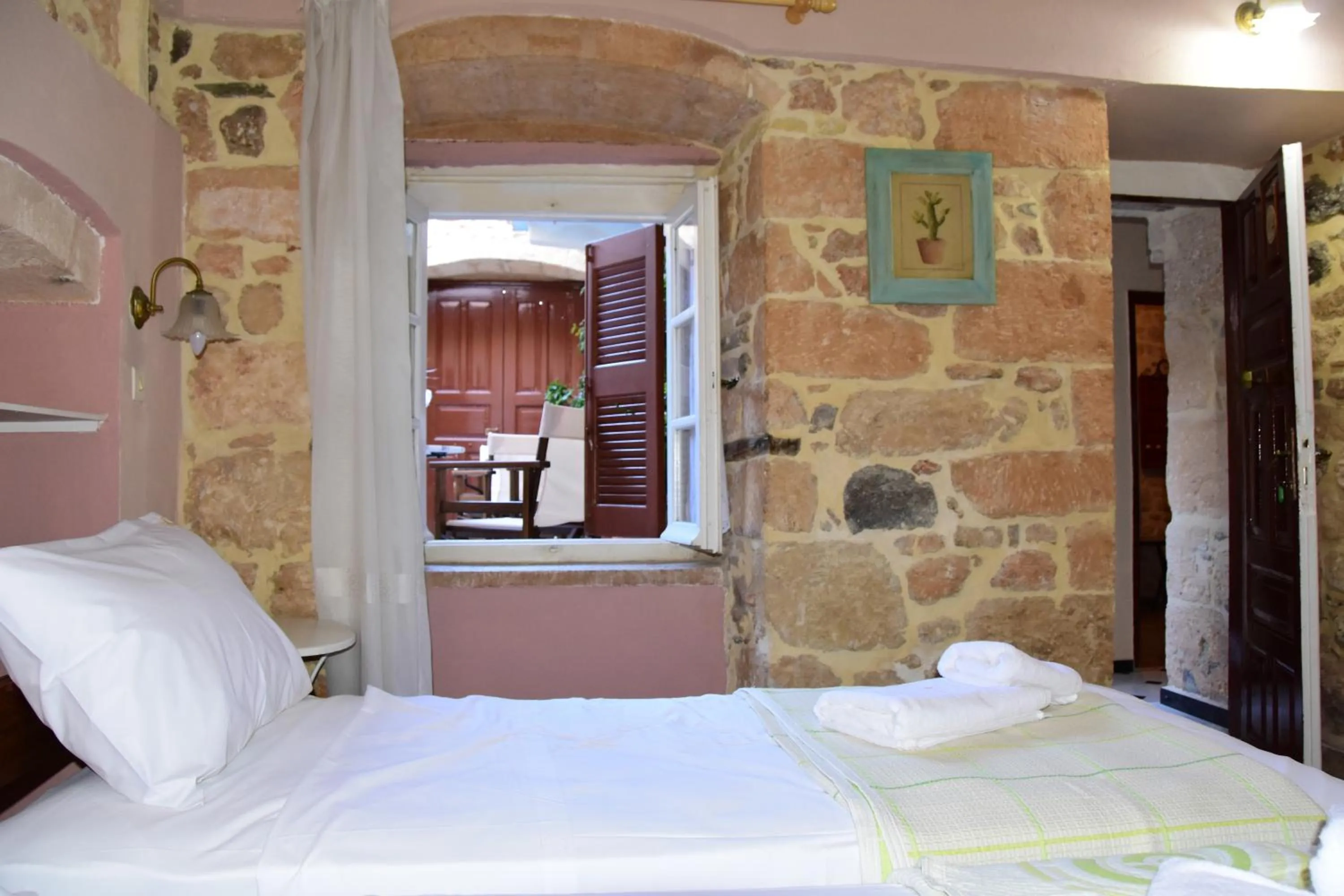 Bed in Aeginitikon Arhontikon Stylish Boutique Hotel