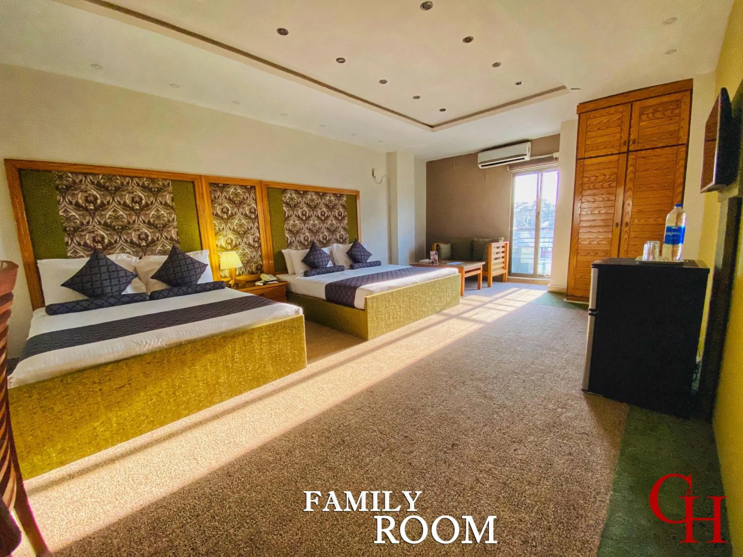 Bed in Grand Islamabad Hotel