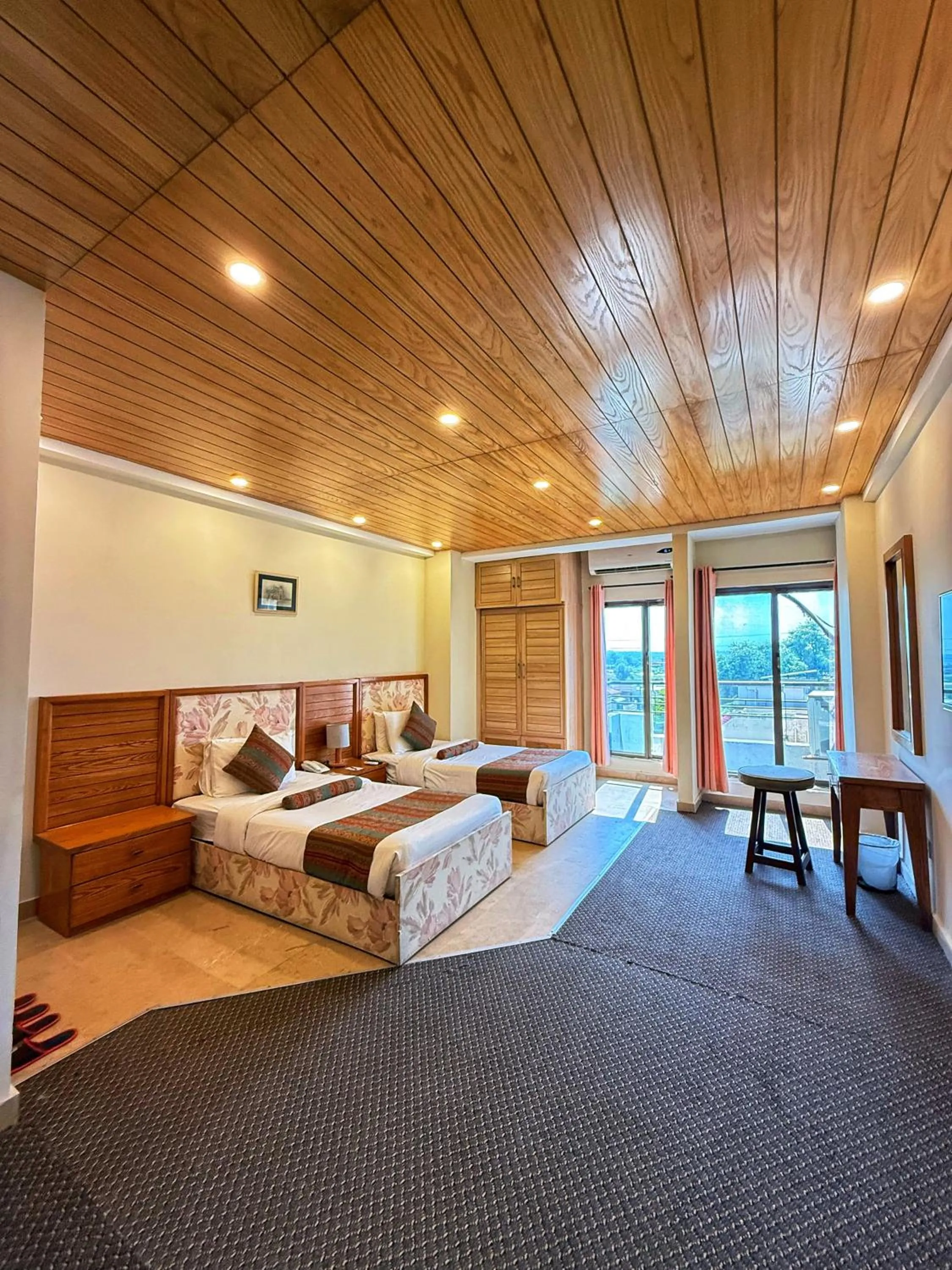 Bed in Grand Islamabad Hotel