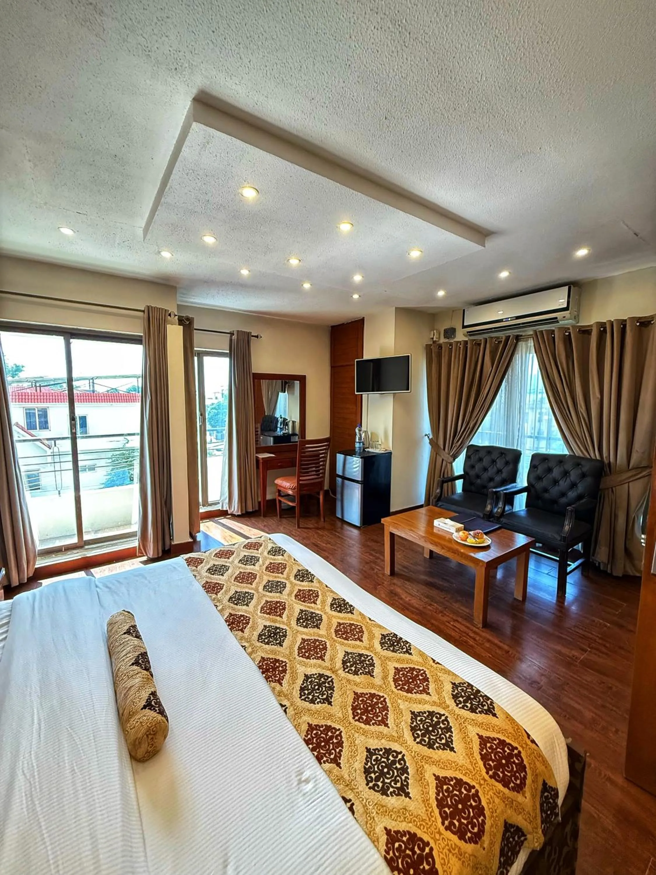 Bed in Grand Islamabad Hotel