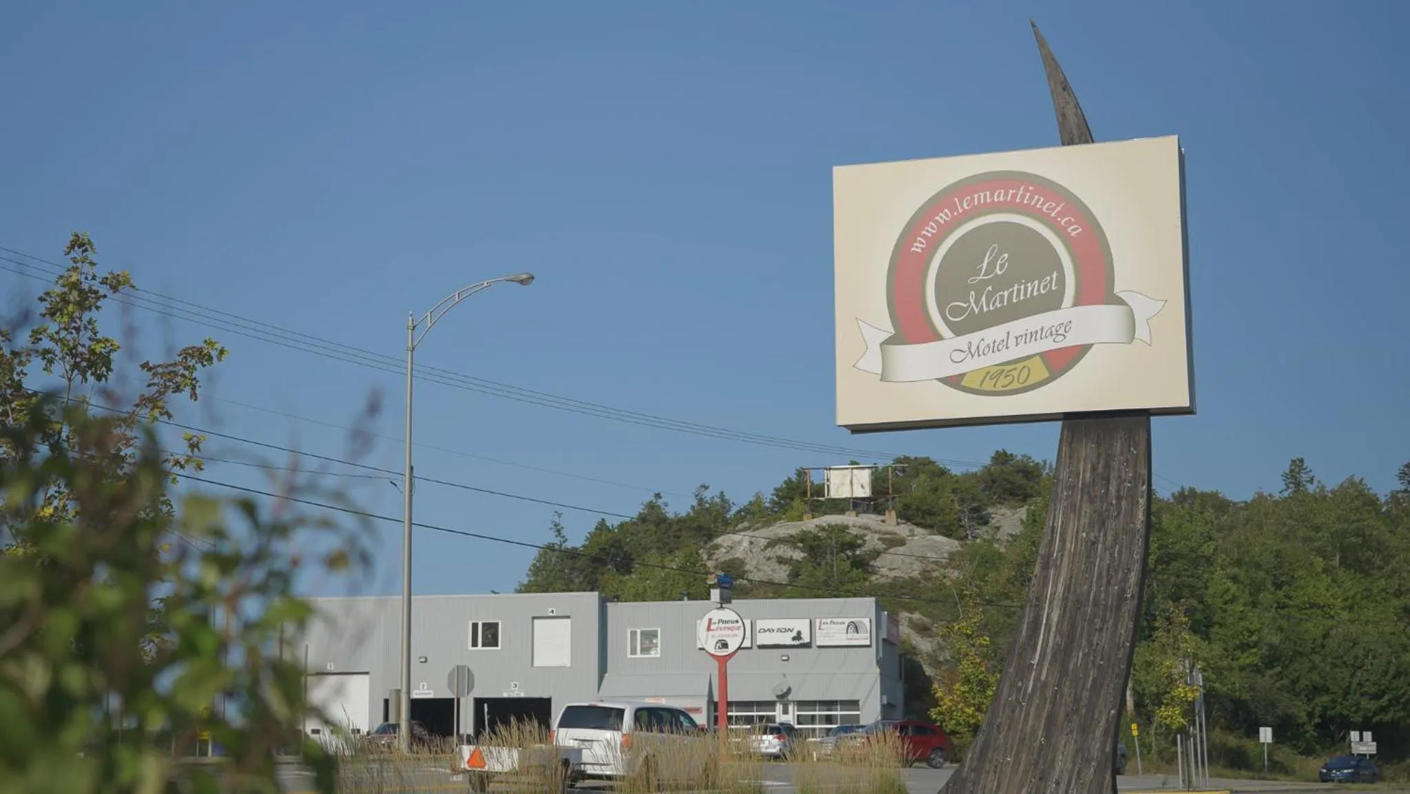 Property logo or sign in Motel Le Martinet