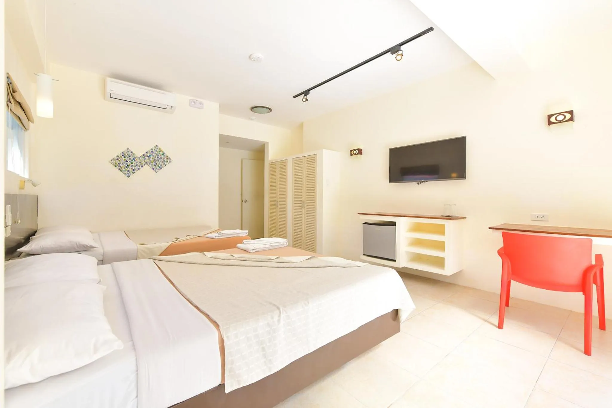 Bed in Signature Boracay South Beach