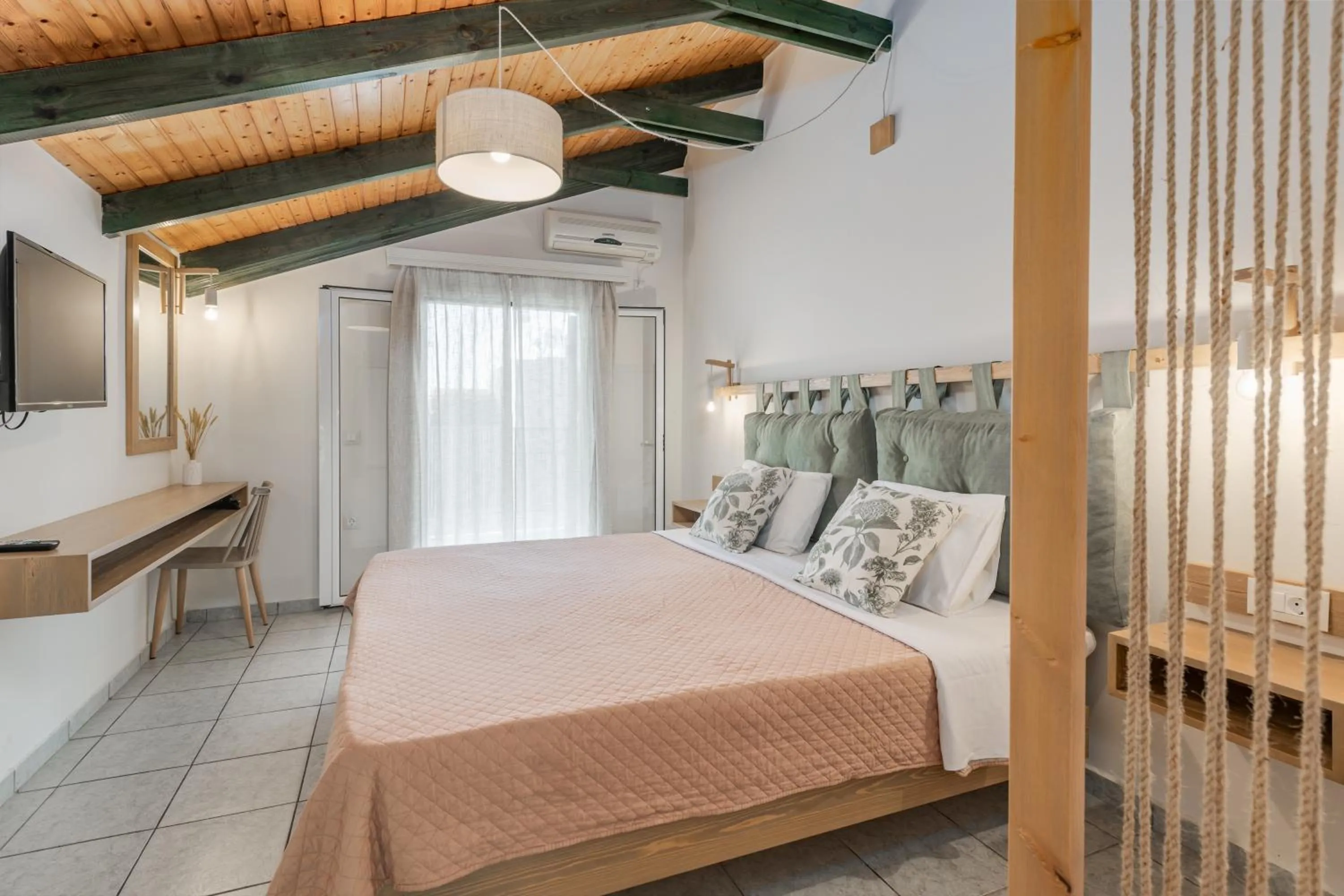 Bed in Sunset Apartments