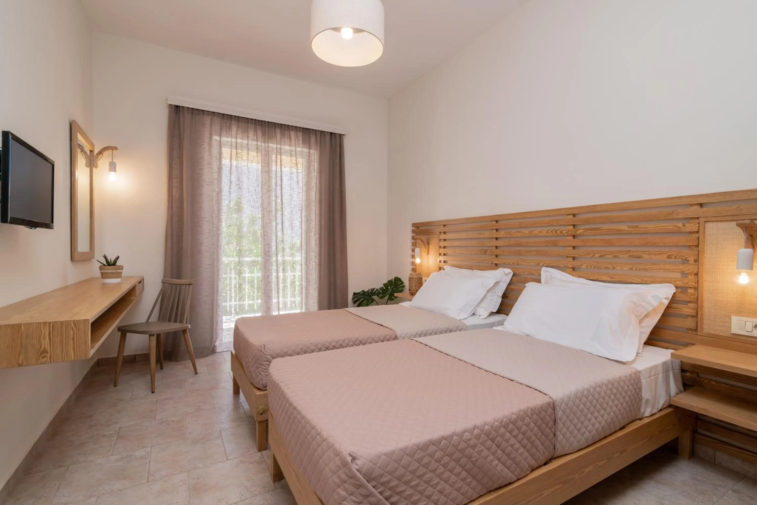 Bed in Sunset Apartments