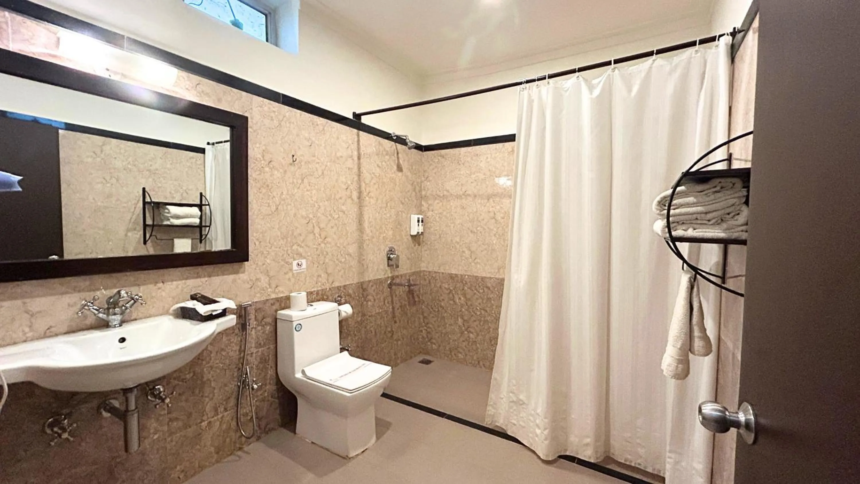 Bathroom in The Pugmark, A Wildlife Resort