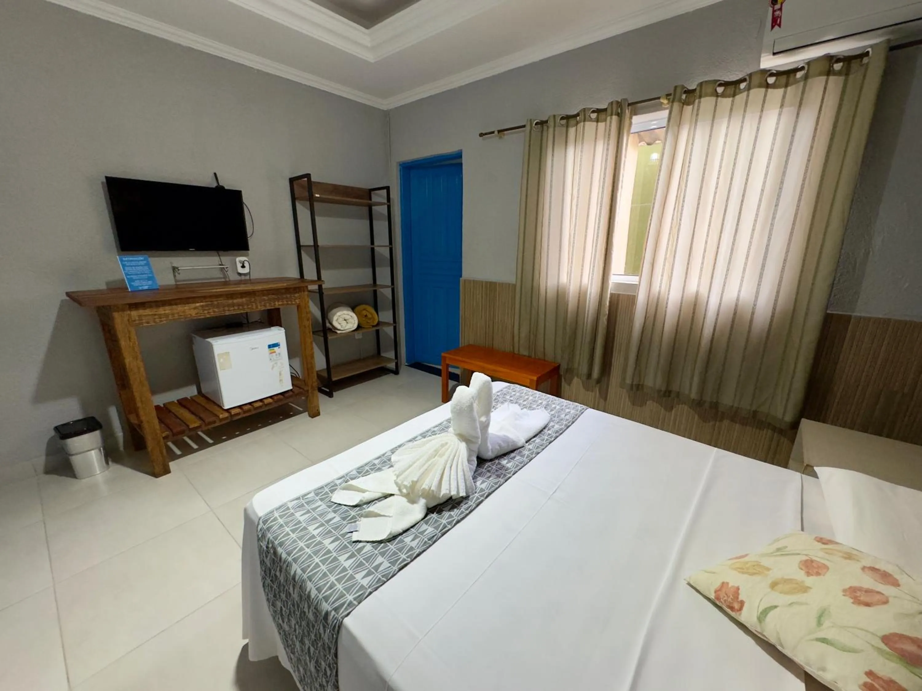 Bedroom, Bed in Pousada Cambará Suítes