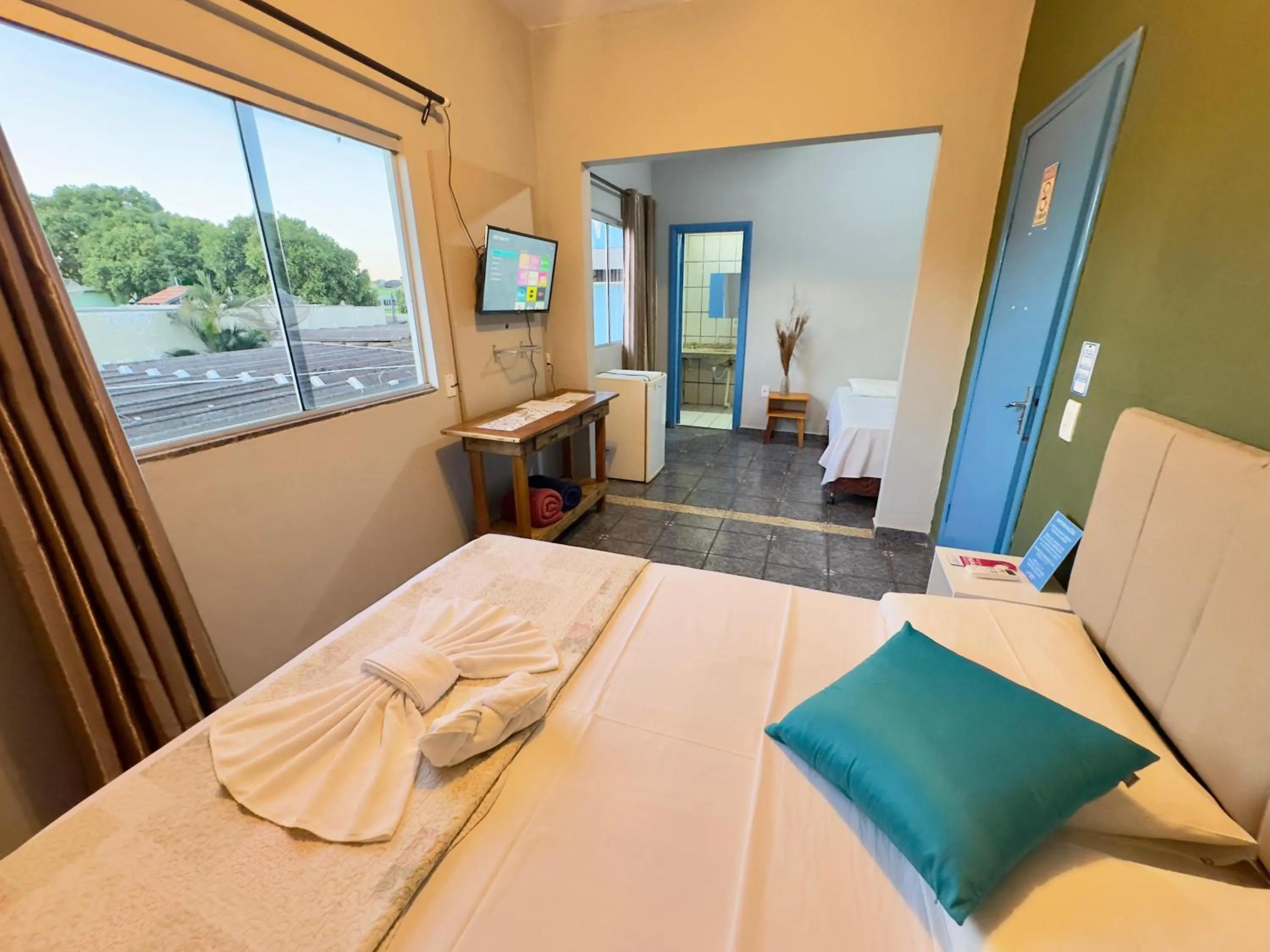 Bedroom, Bed in Pousada Cambará Suítes