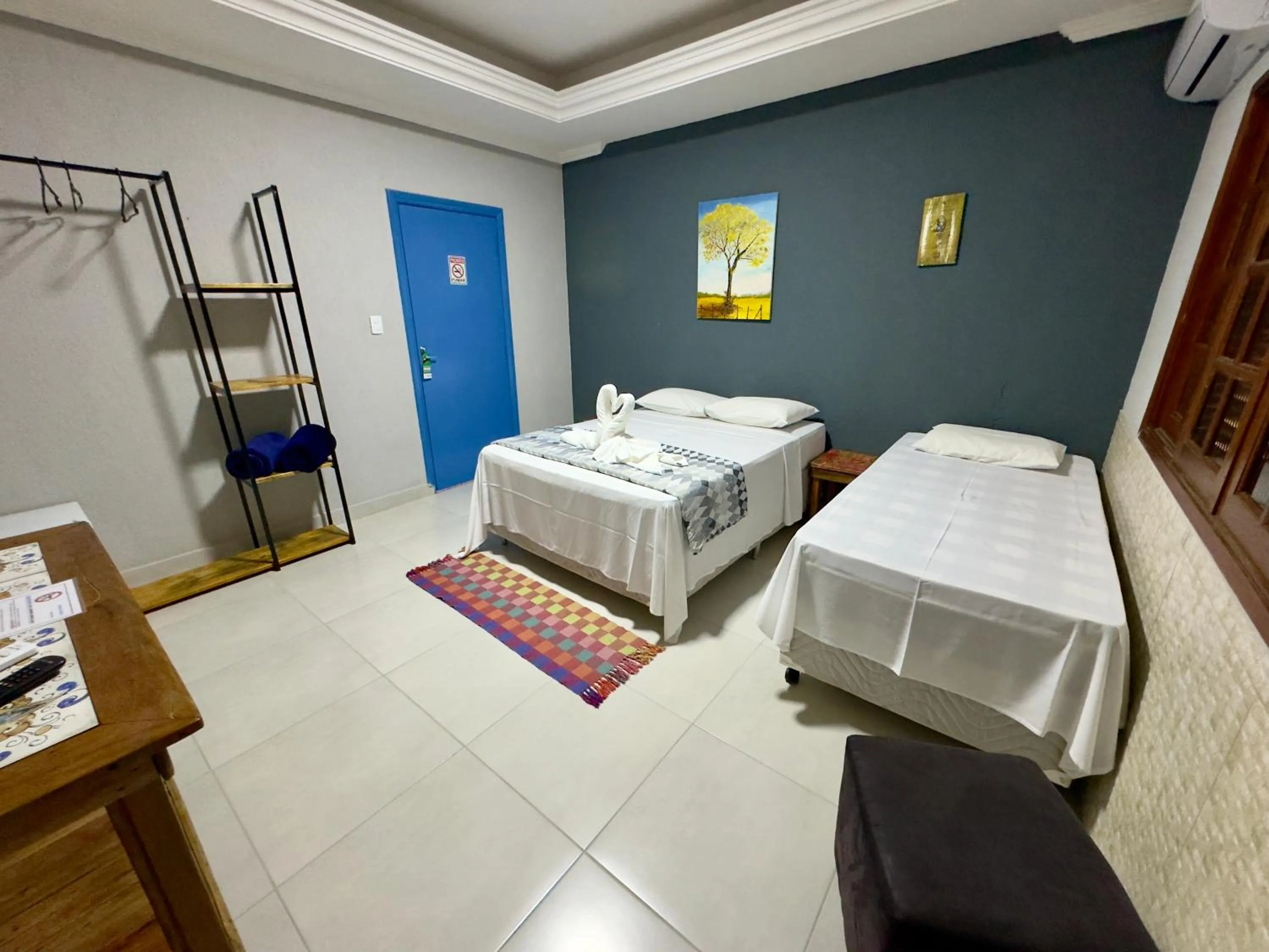 Bedroom, Bed in Pousada Cambará Suítes