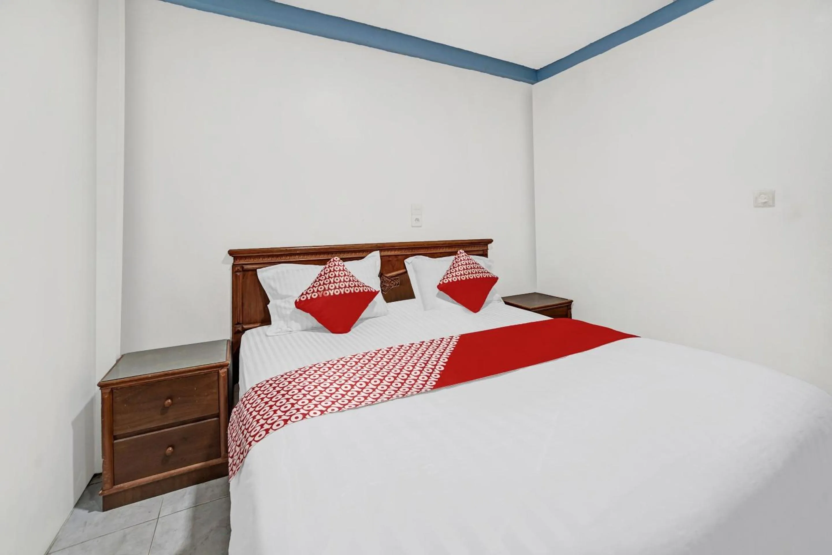 Bedroom, Bed in Hotel O Wisma Kuta Karang Baru