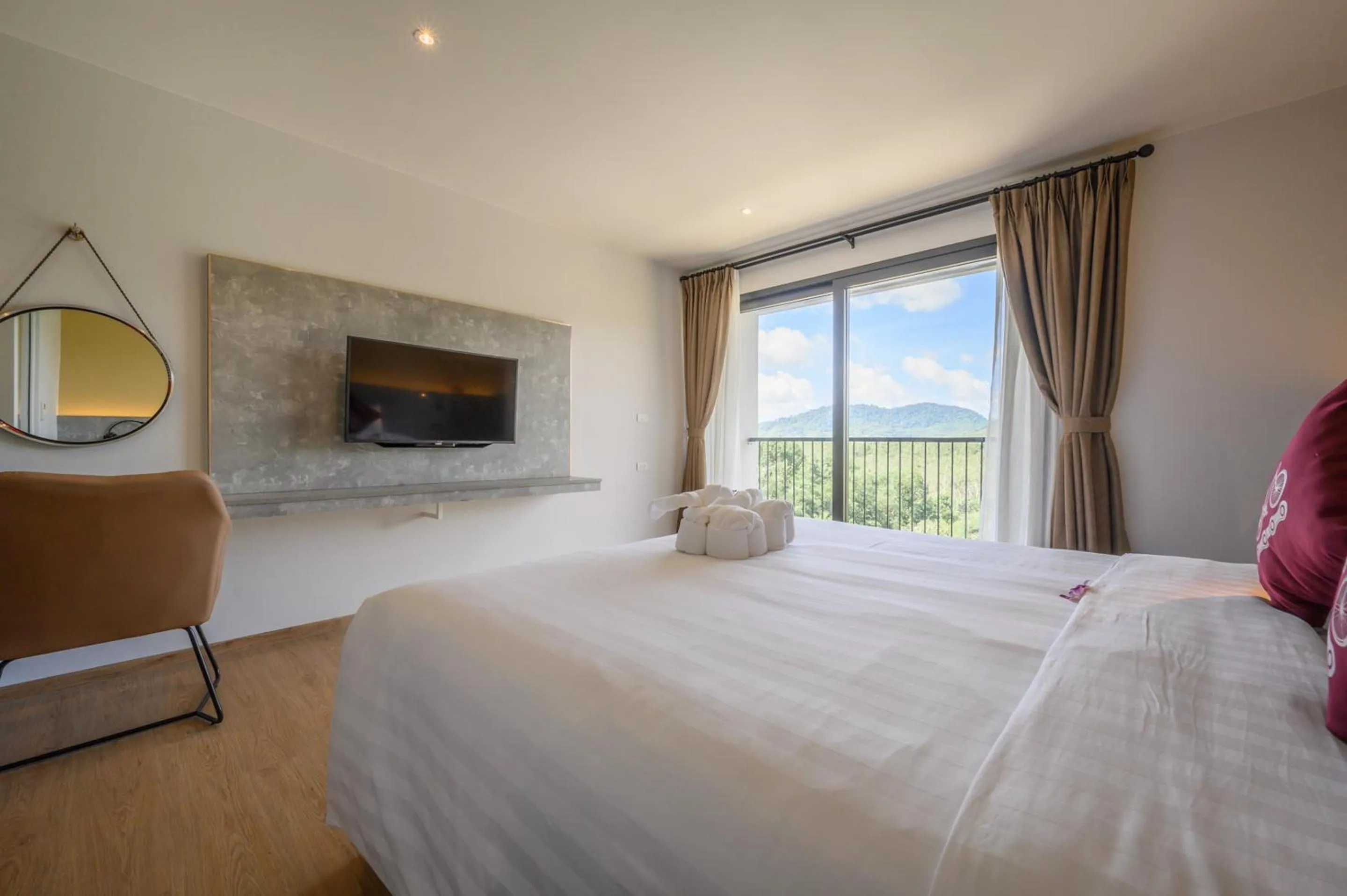 Bed in Tour De Phuket Hotel - SHA Plus