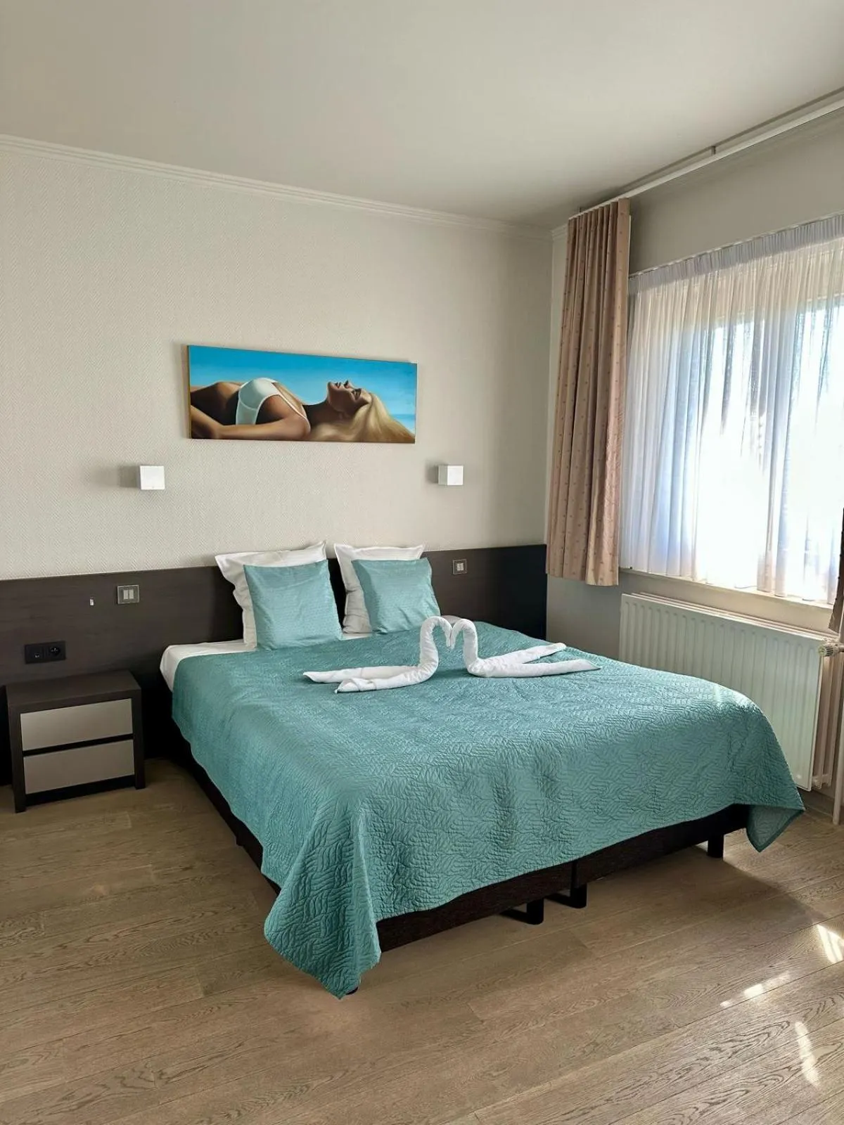 Bed in Hotel Monaco Zeebrugge Beach by Rikas Hotels